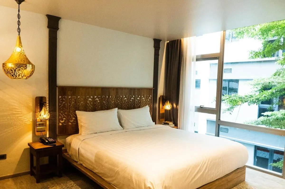 Photo of the whole room, Bed in Tints of Blue Hotel