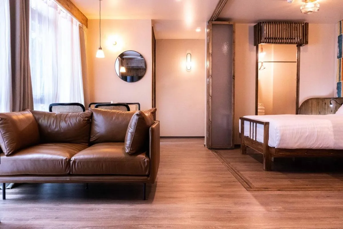 Living room, Bed in Tints of Blue Hotel