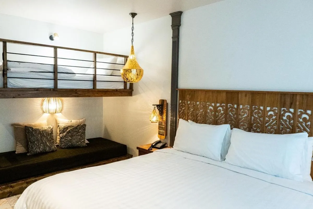 Photo of the whole room, Bed in Tints of Blue Hotel