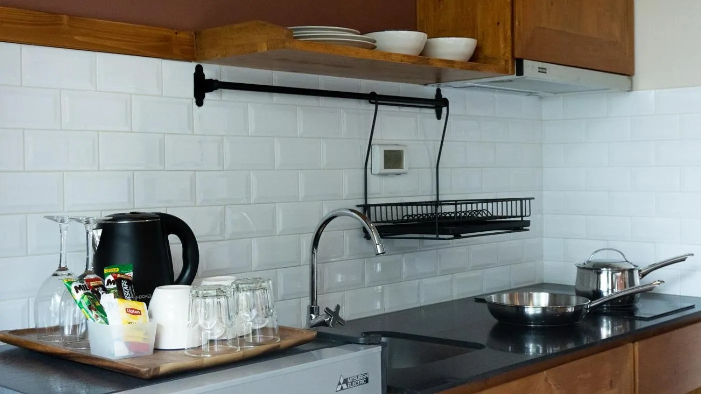 Kitchen or kitchenette in Tints of Blue Hotel