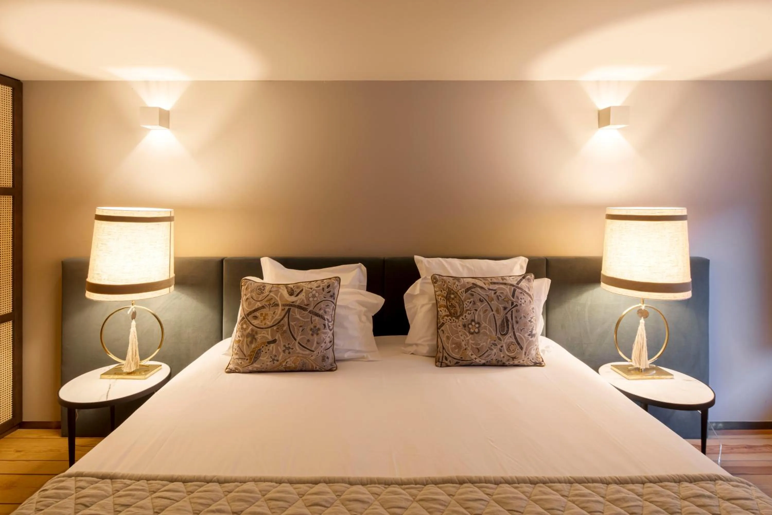 Bed in Condes de Azevedo Palace Apartments