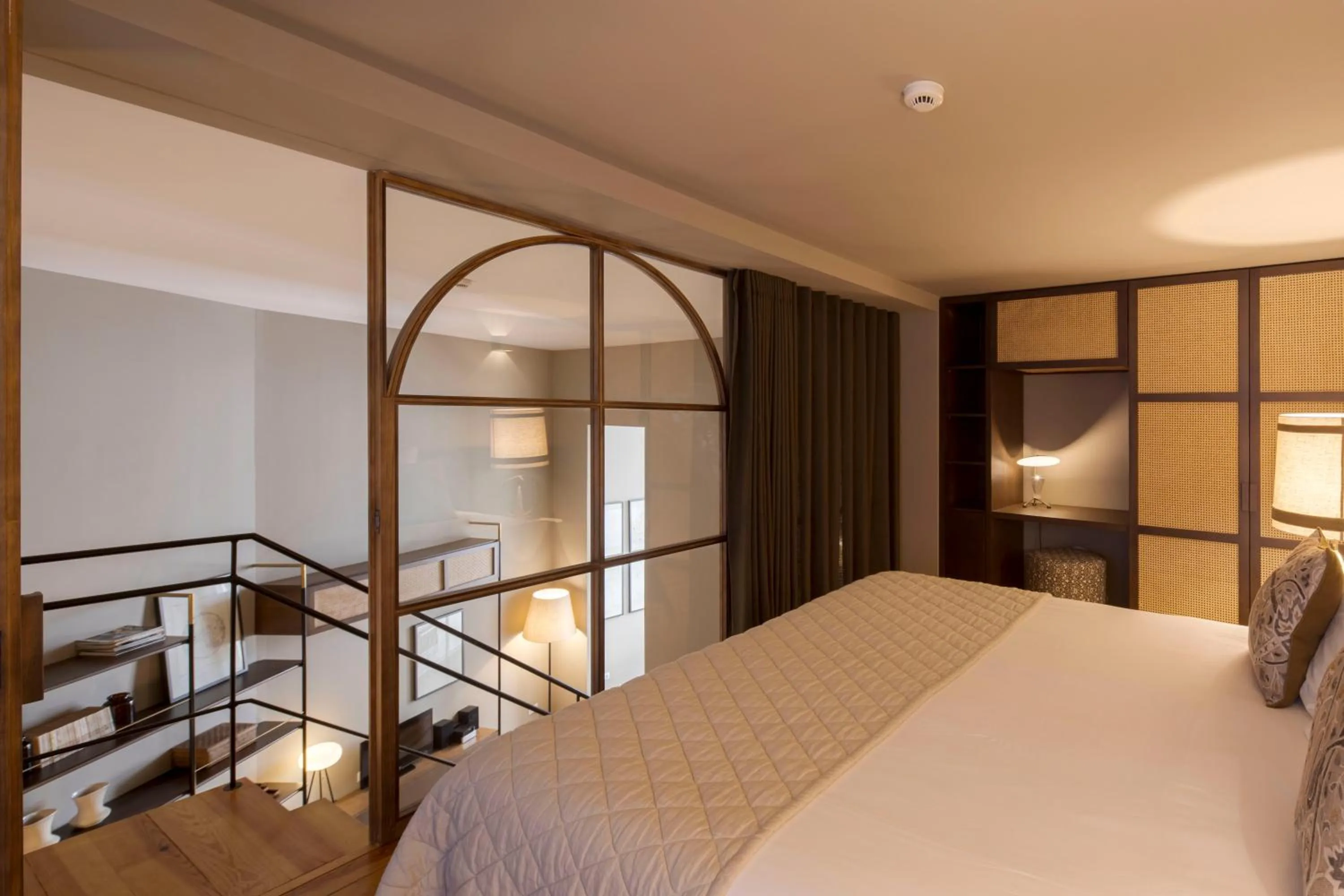 Bed in Condes de Azevedo Palace Apartments