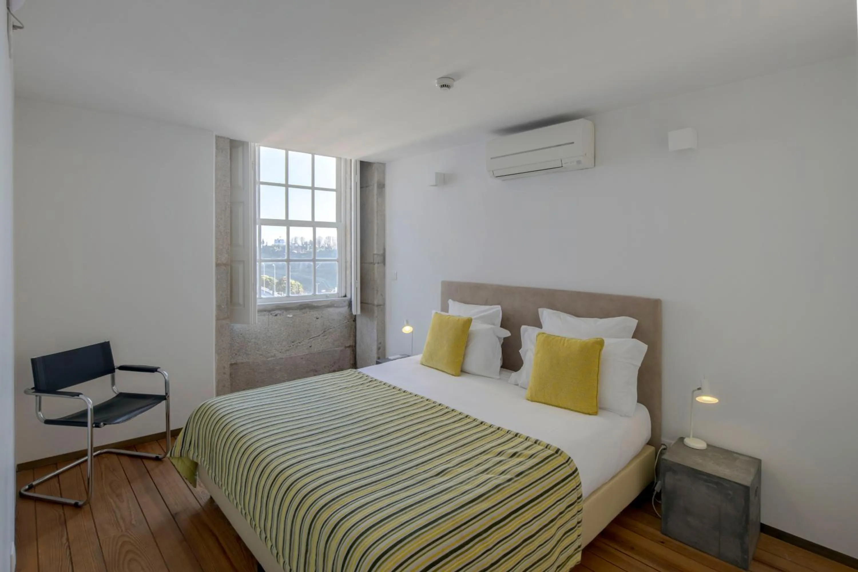 Bed in Condes de Azevedo Palace Apartments