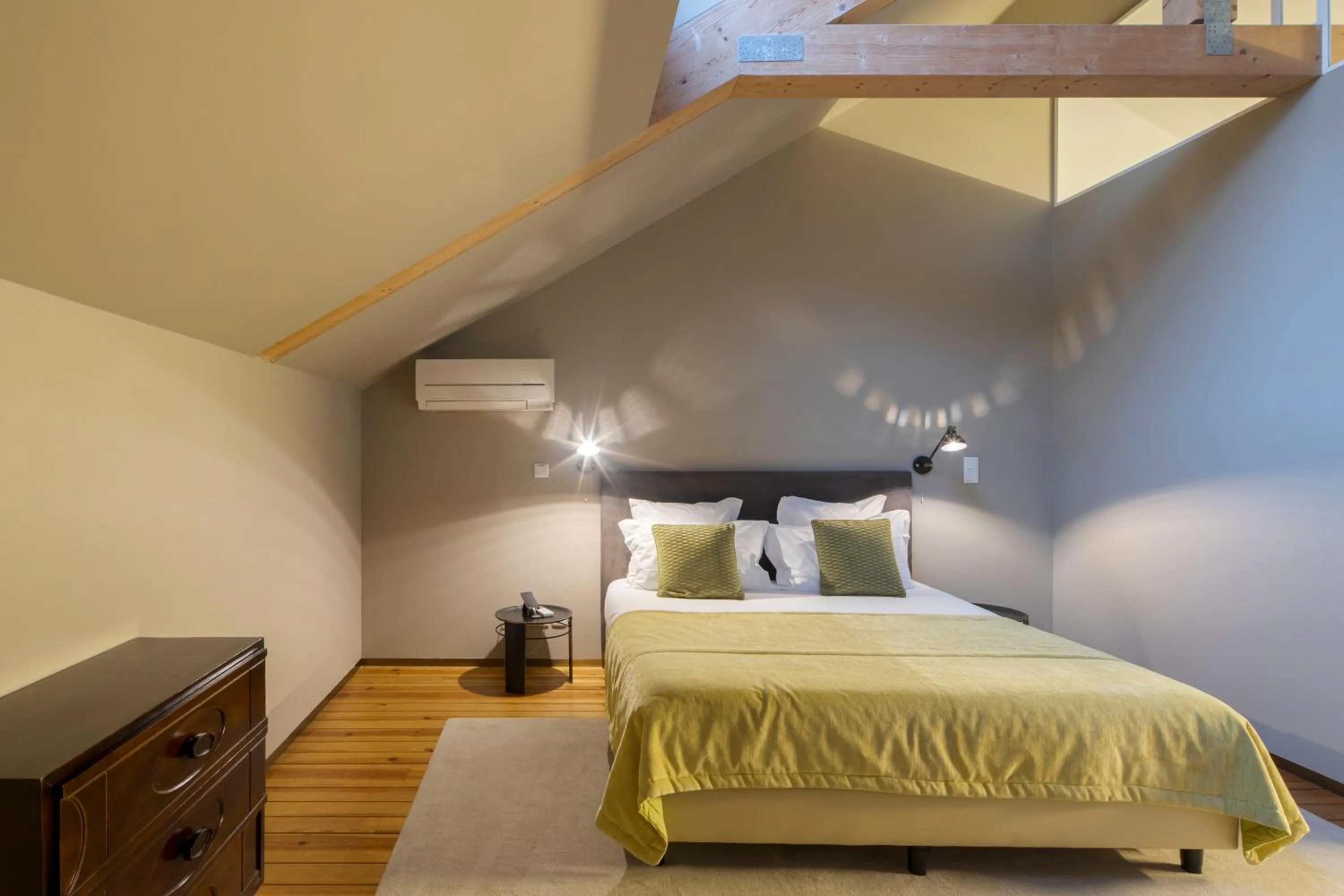 Bed in Condes de Azevedo Palace Apartments