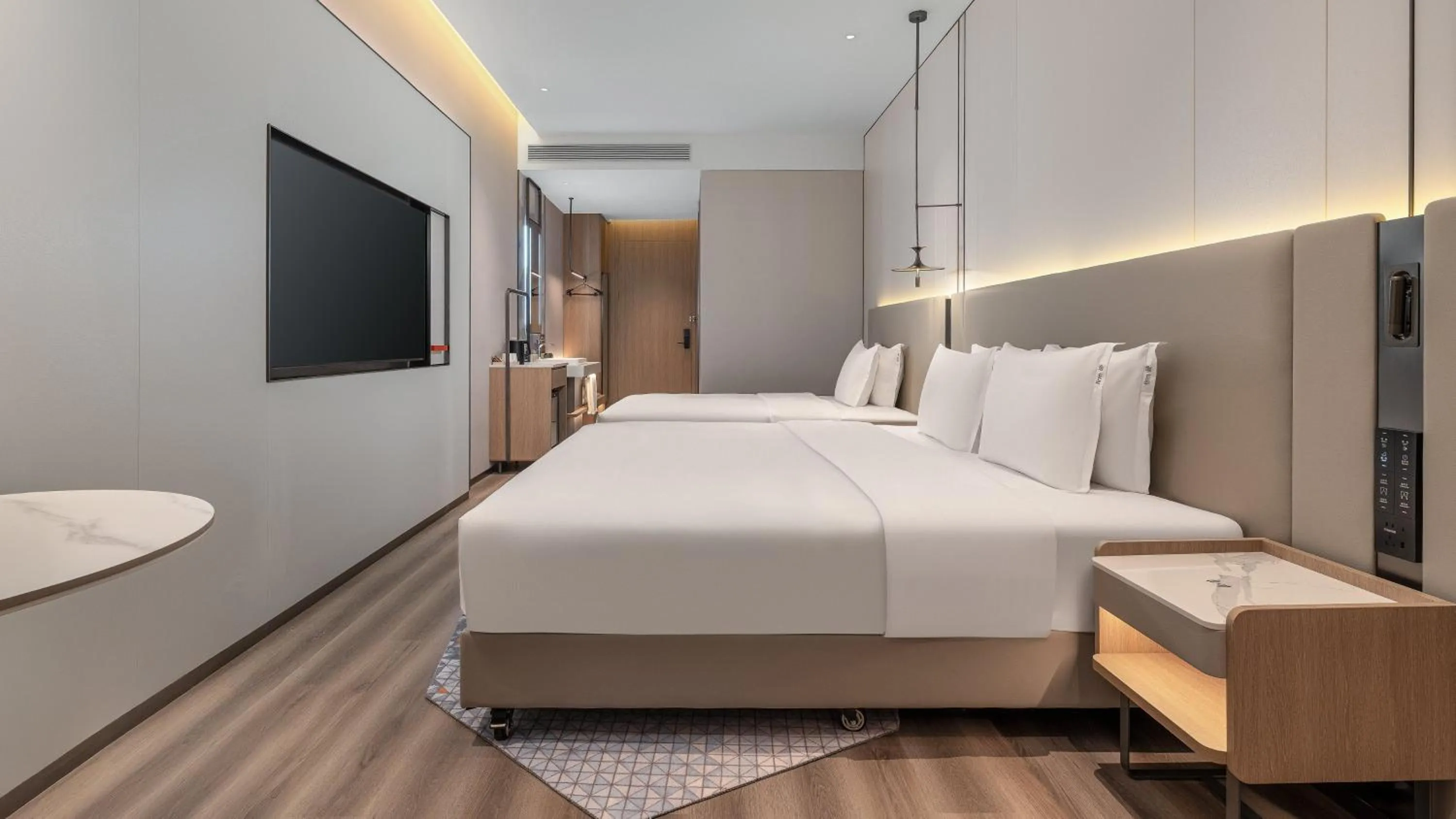 Standard Room with One Double and One King Bed in Holiday Inn Express Kunming Dianchi Rixin Road by IHG