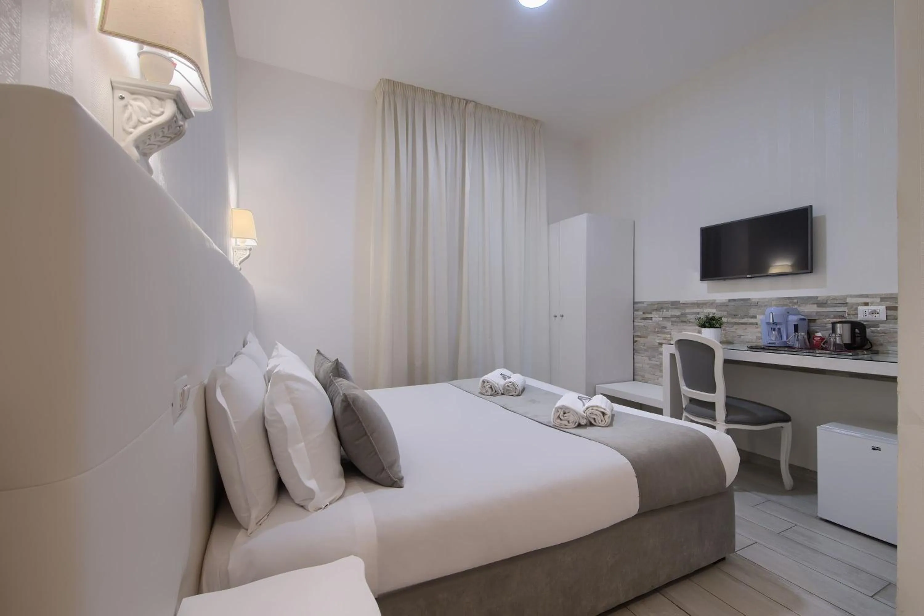 Bed in Vatican Tourist Inn