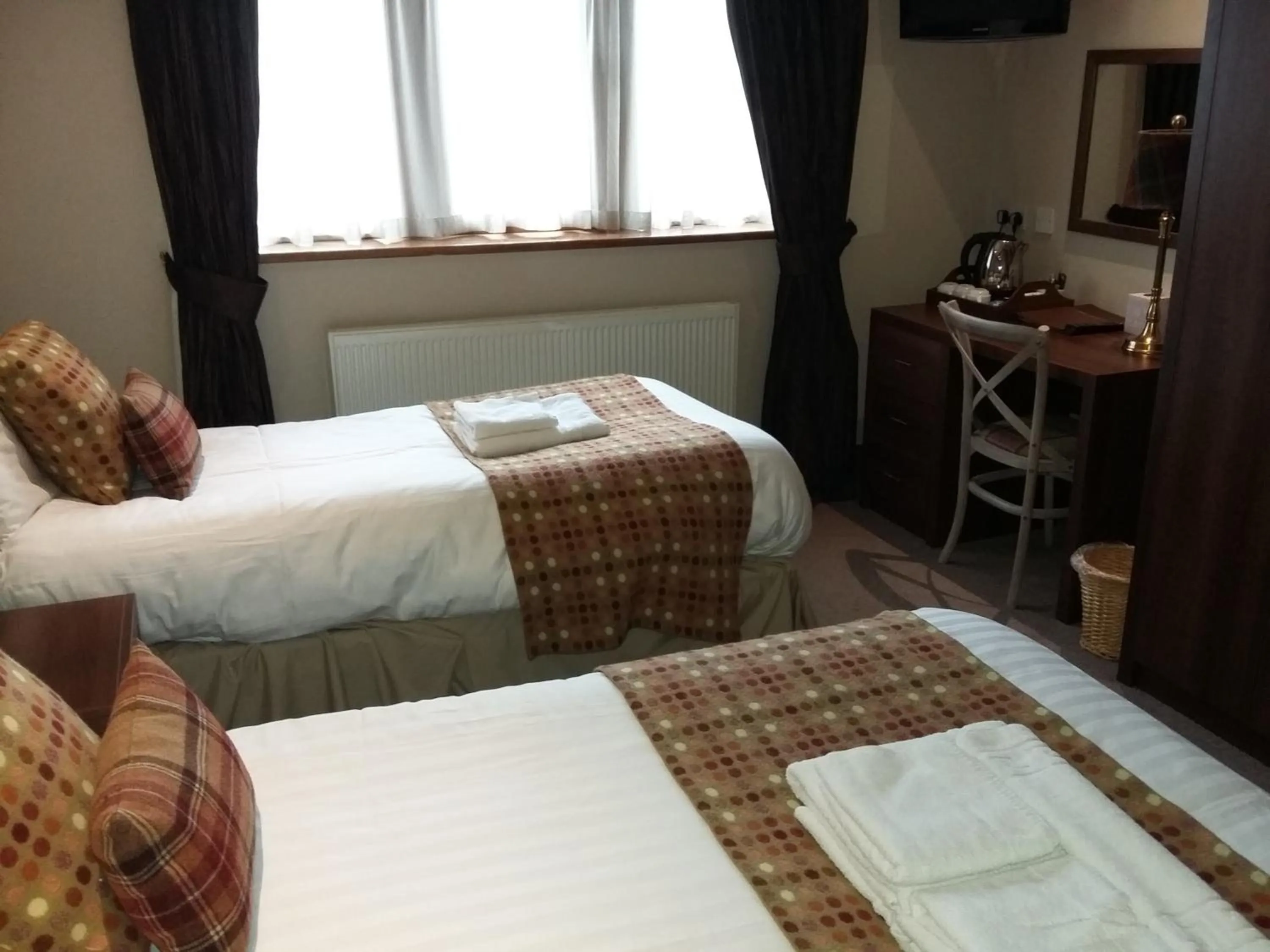 Bed in The Huntsman Inn