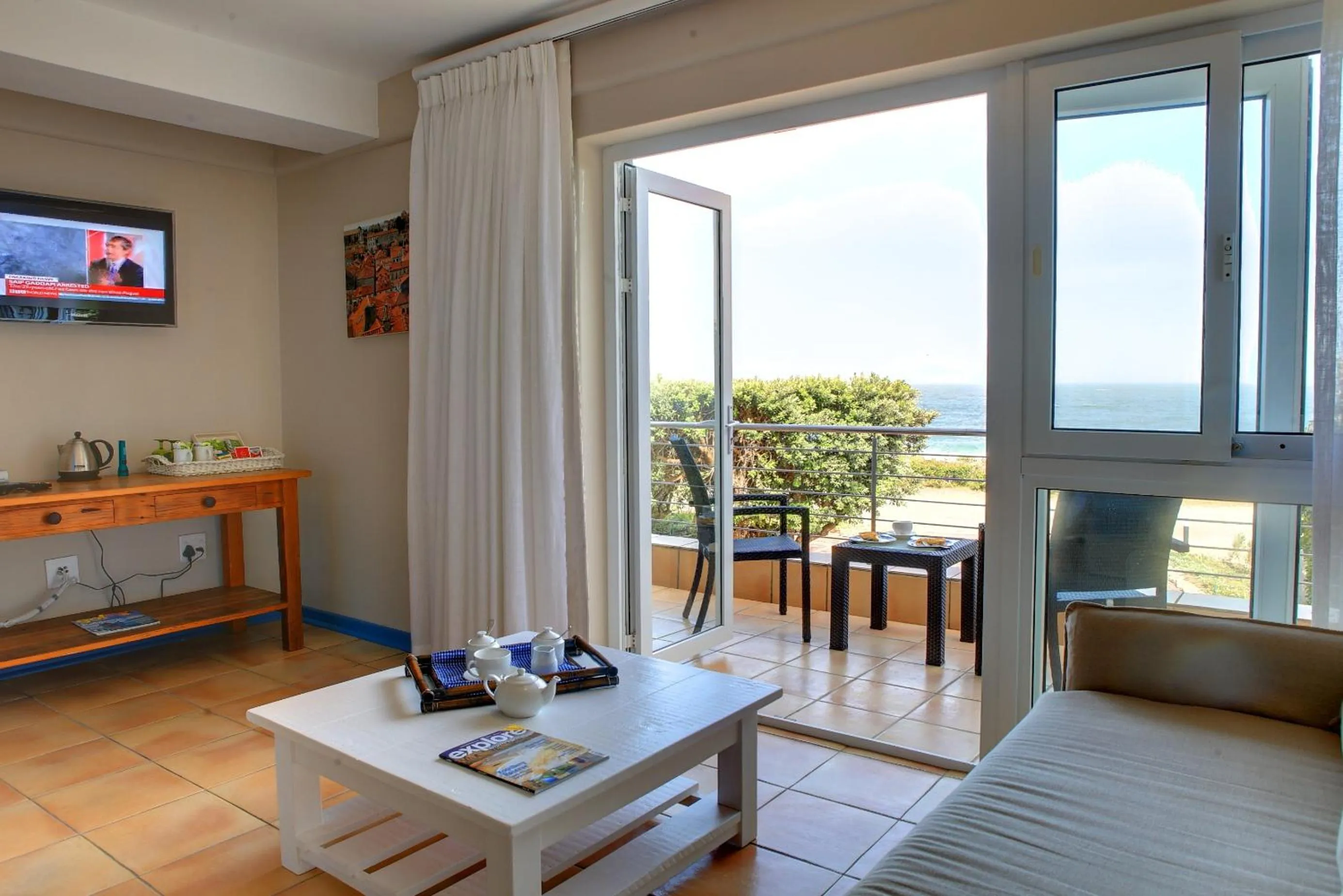 Living room in Periwinkle Lodge Guest House