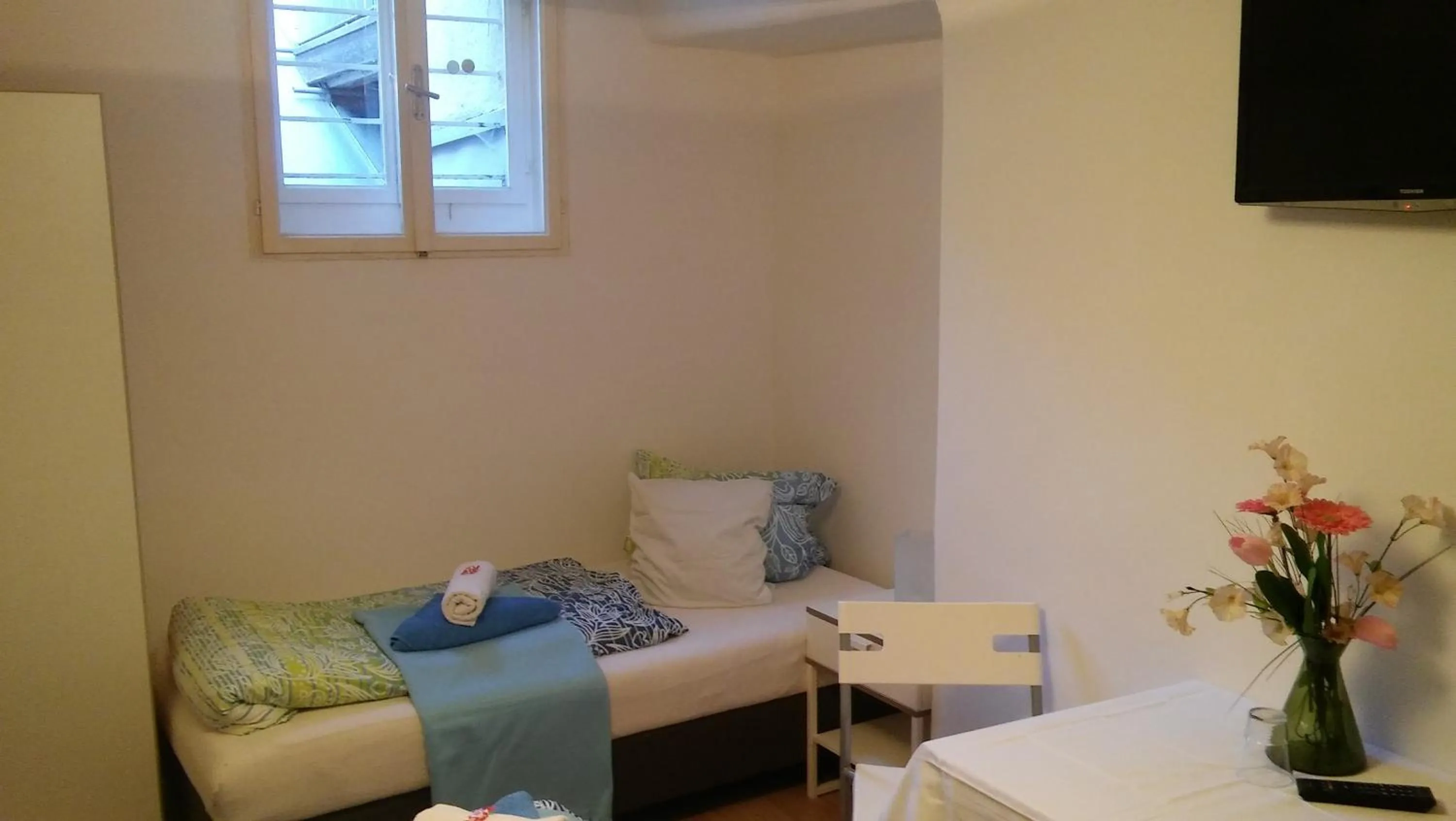 Bed in Cityhotel Junger Fuchs