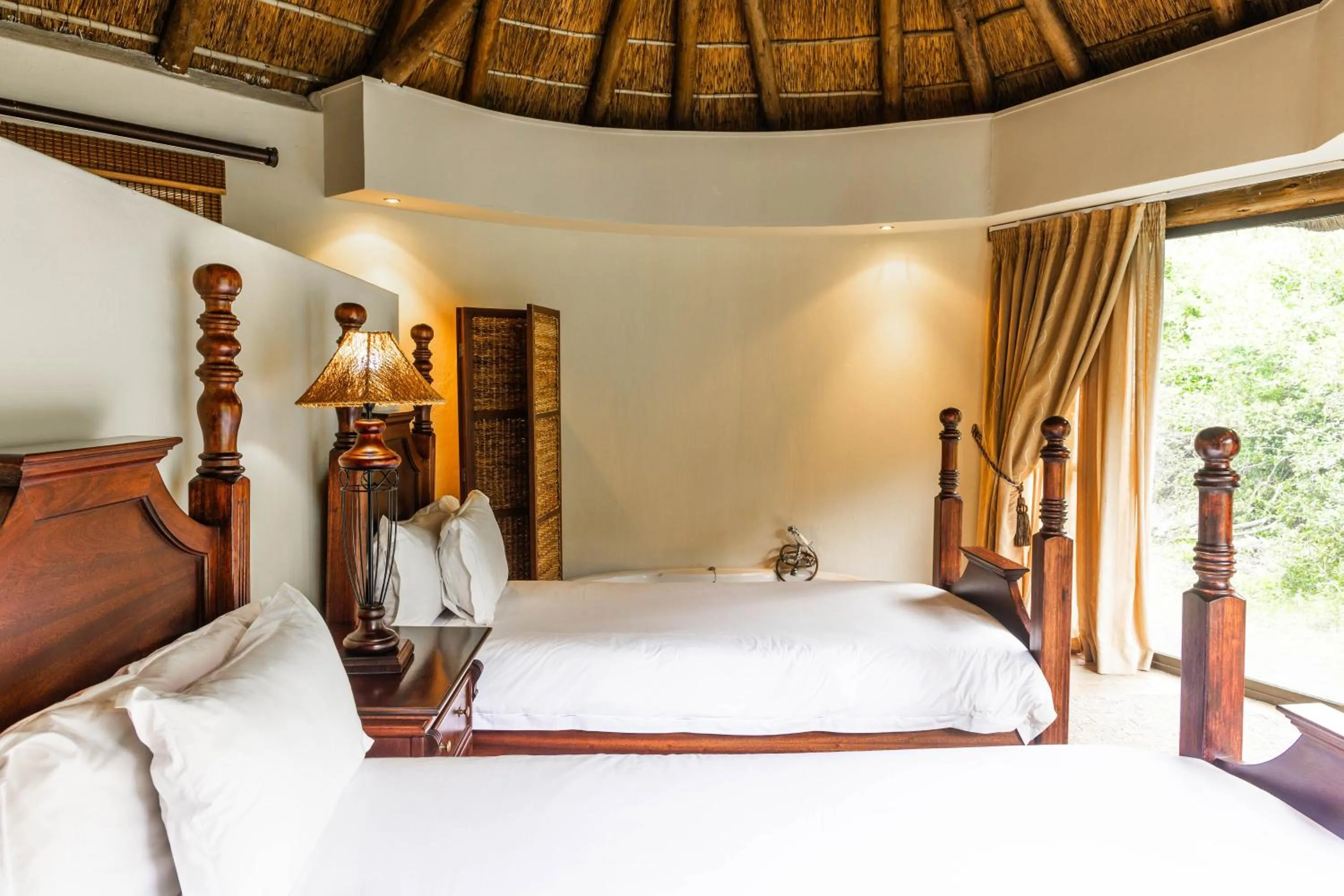 Bed in Premier Resort Mpongo Private Game Reserve