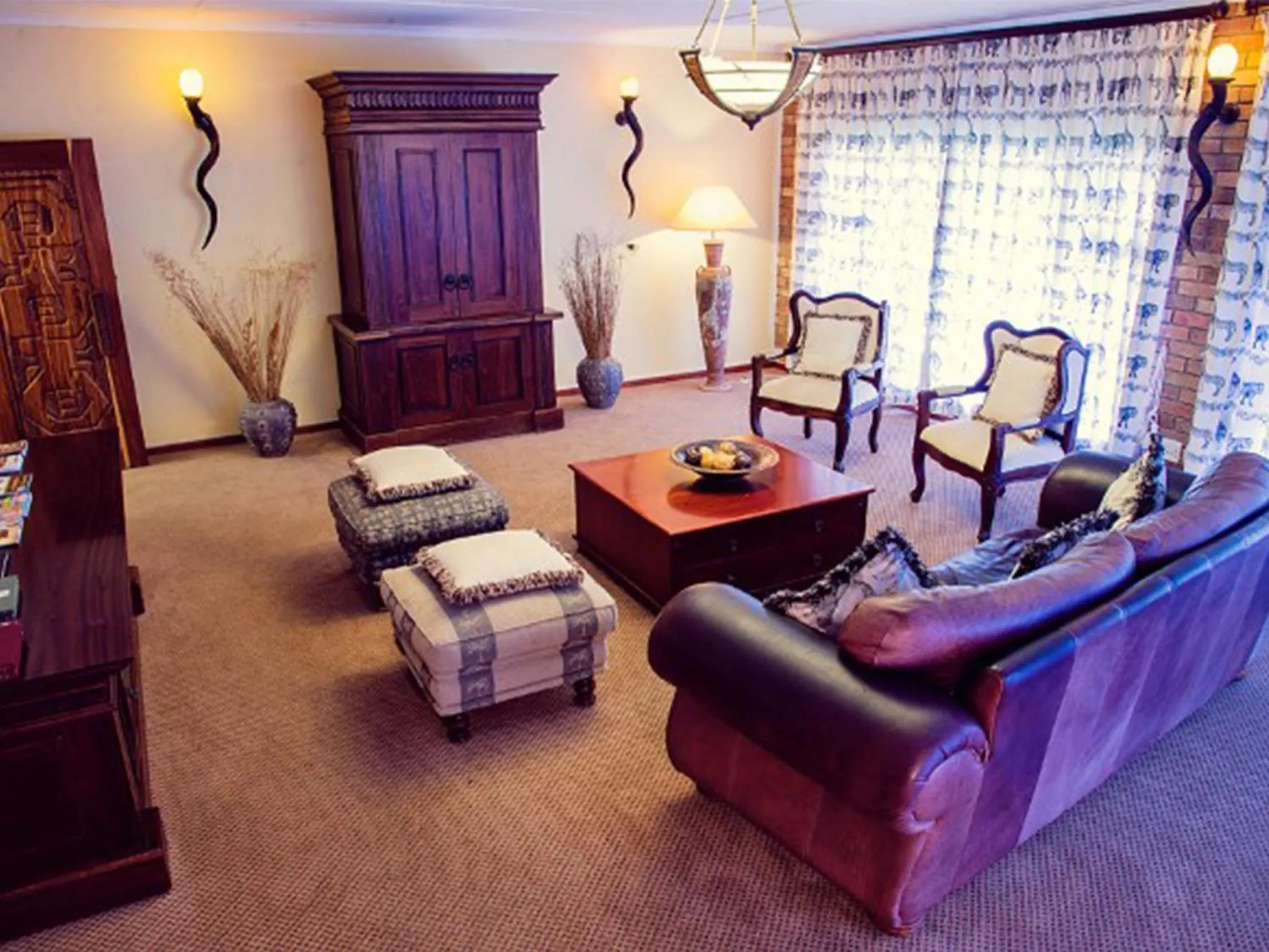 Living room, Bed in Premier Resort Mpongo Private Game Reserve