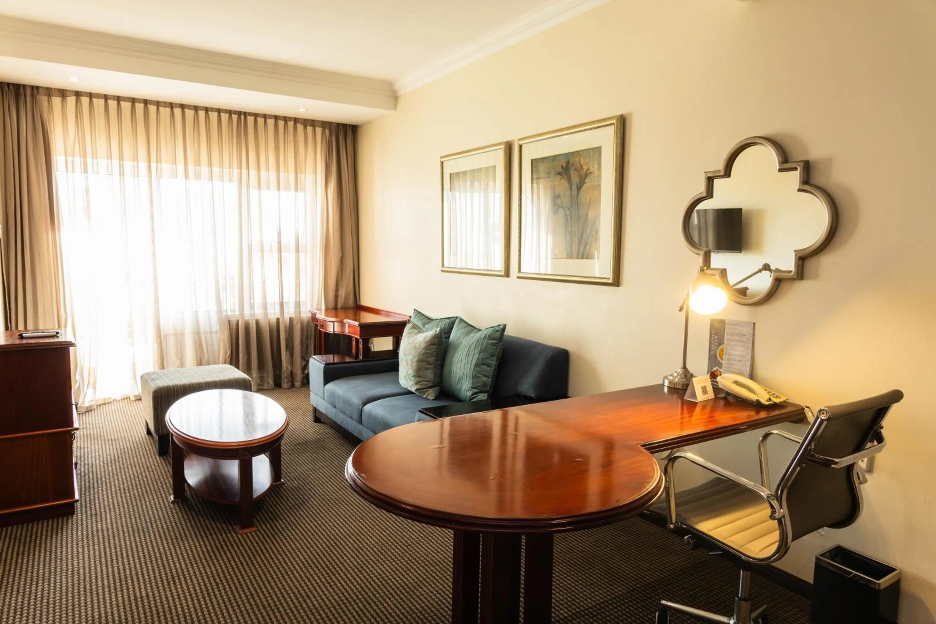 Living room in Premier Hotel Regent