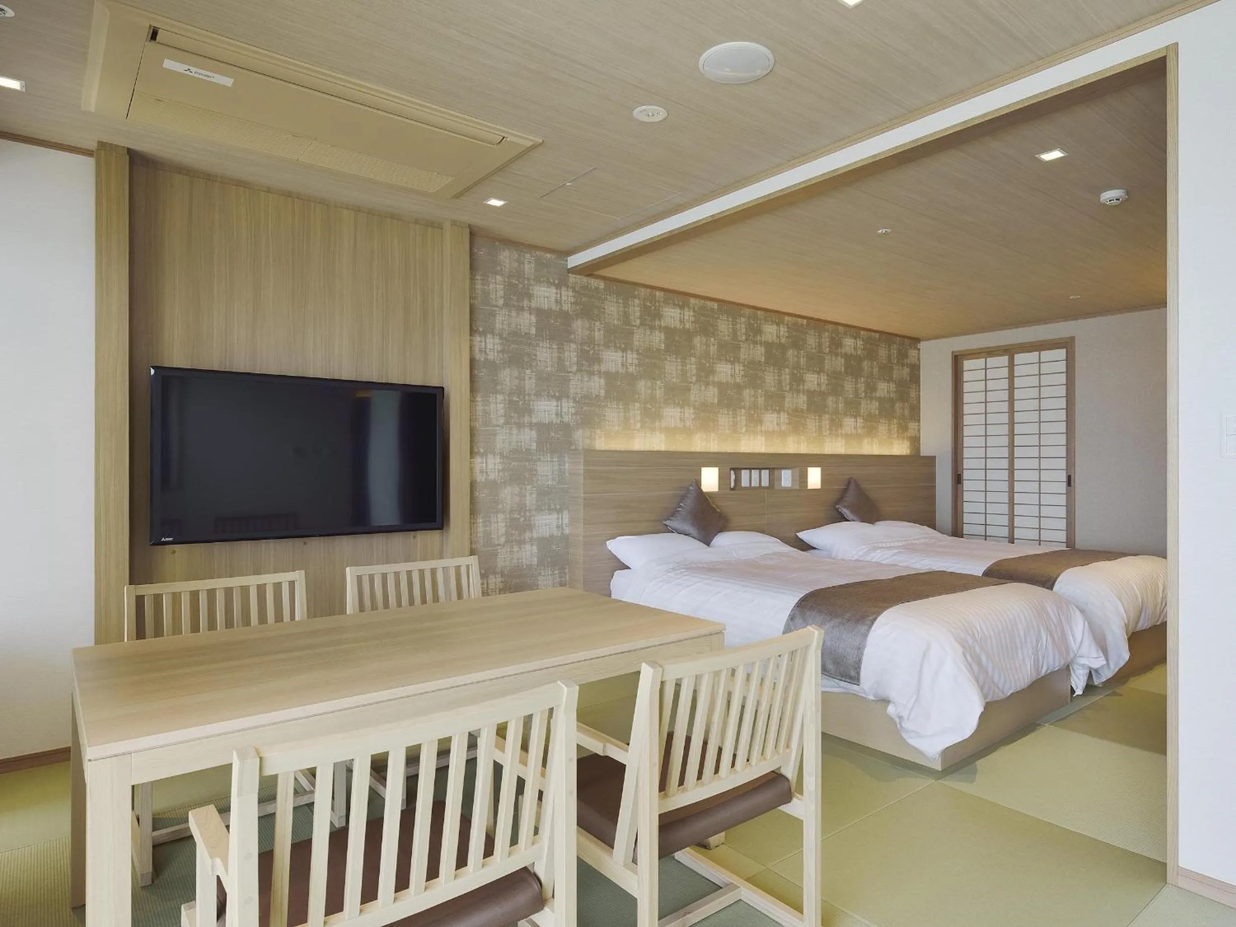 Bed in Kamogawa Grand Hotel