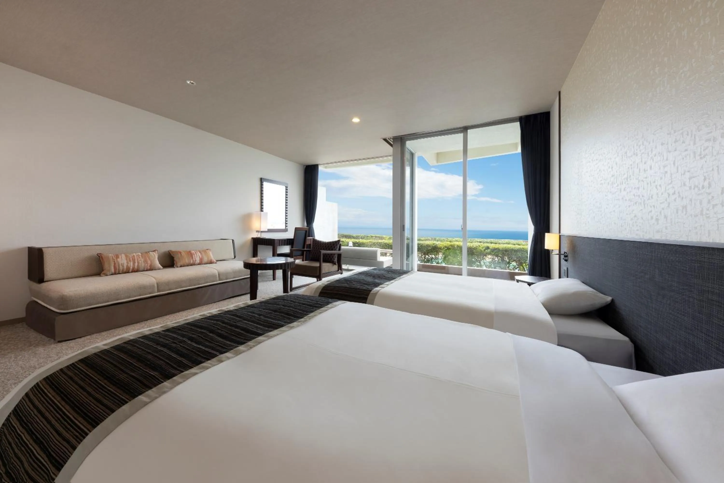 Bed in Kamogawa Grand Hotel