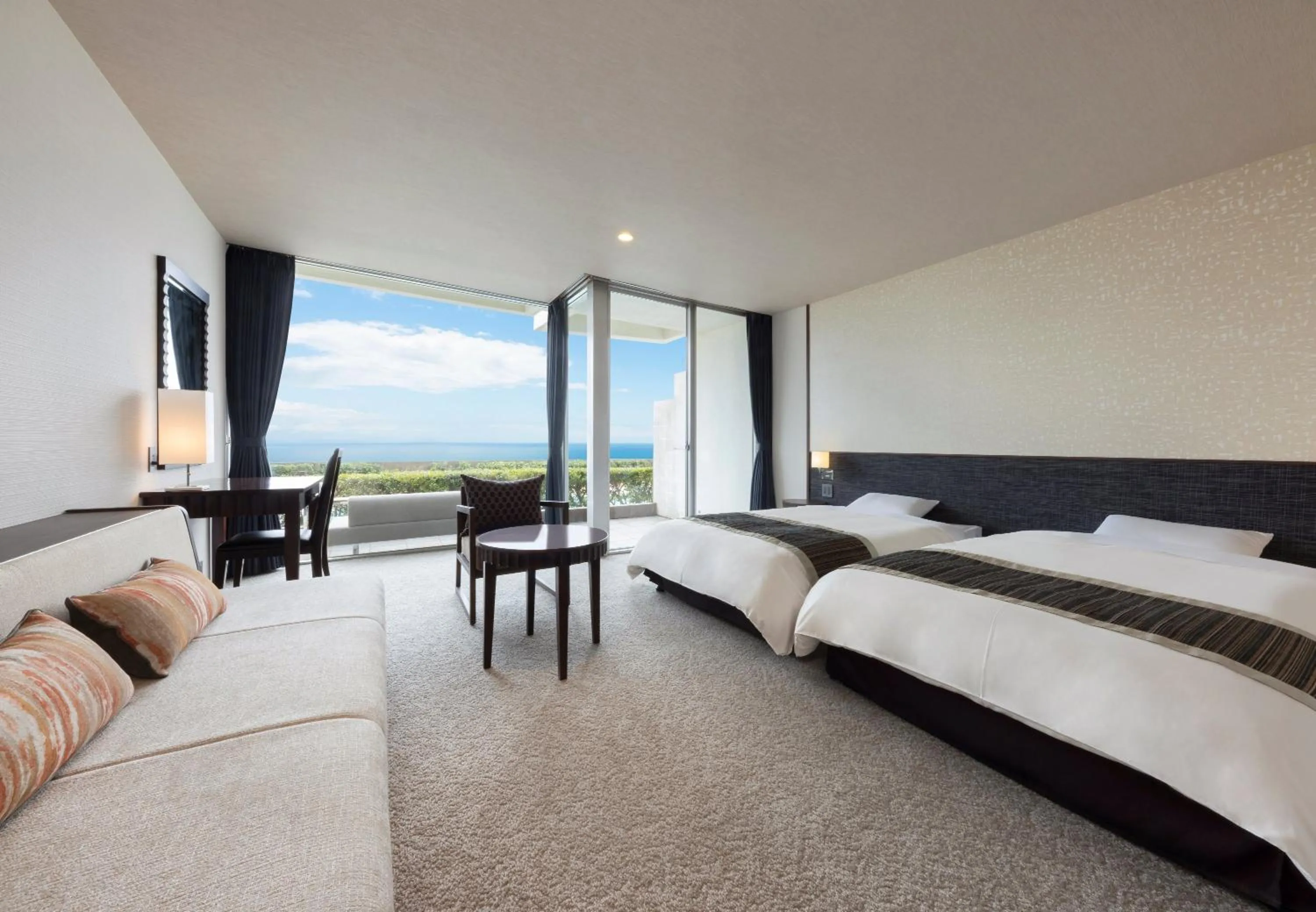 Bed in Kamogawa Grand Hotel