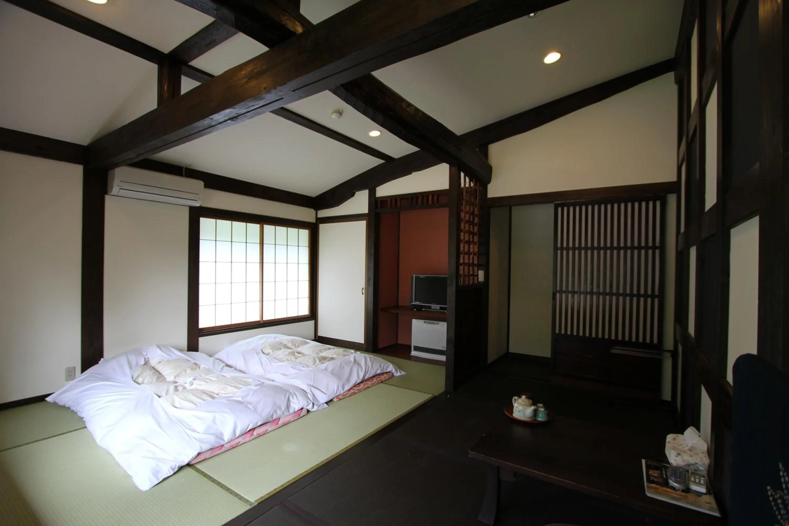 Photo of the whole room, Bed in Minshuku Takizawa