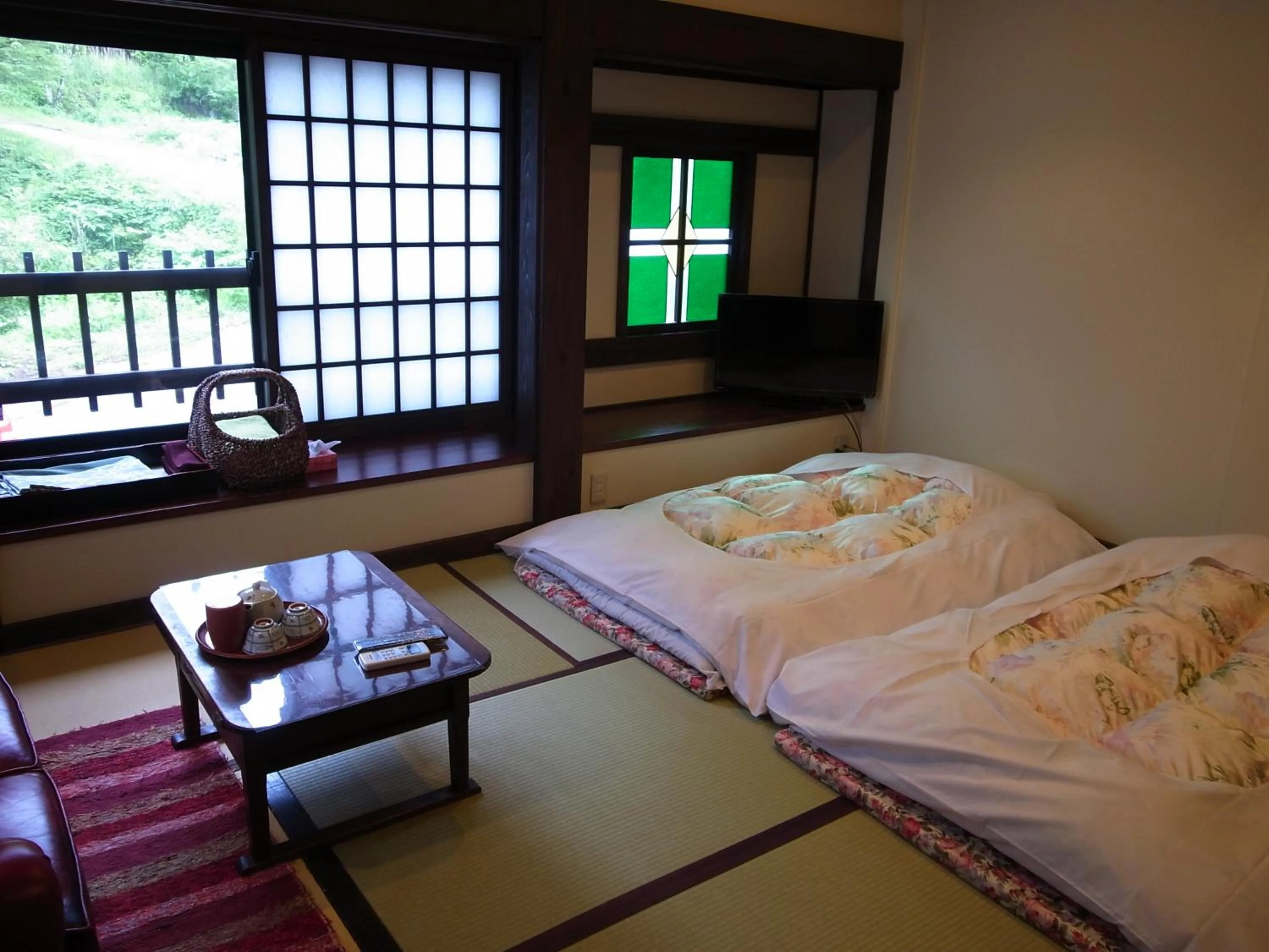 Photo of the whole room, Bed in Minshuku Takizawa