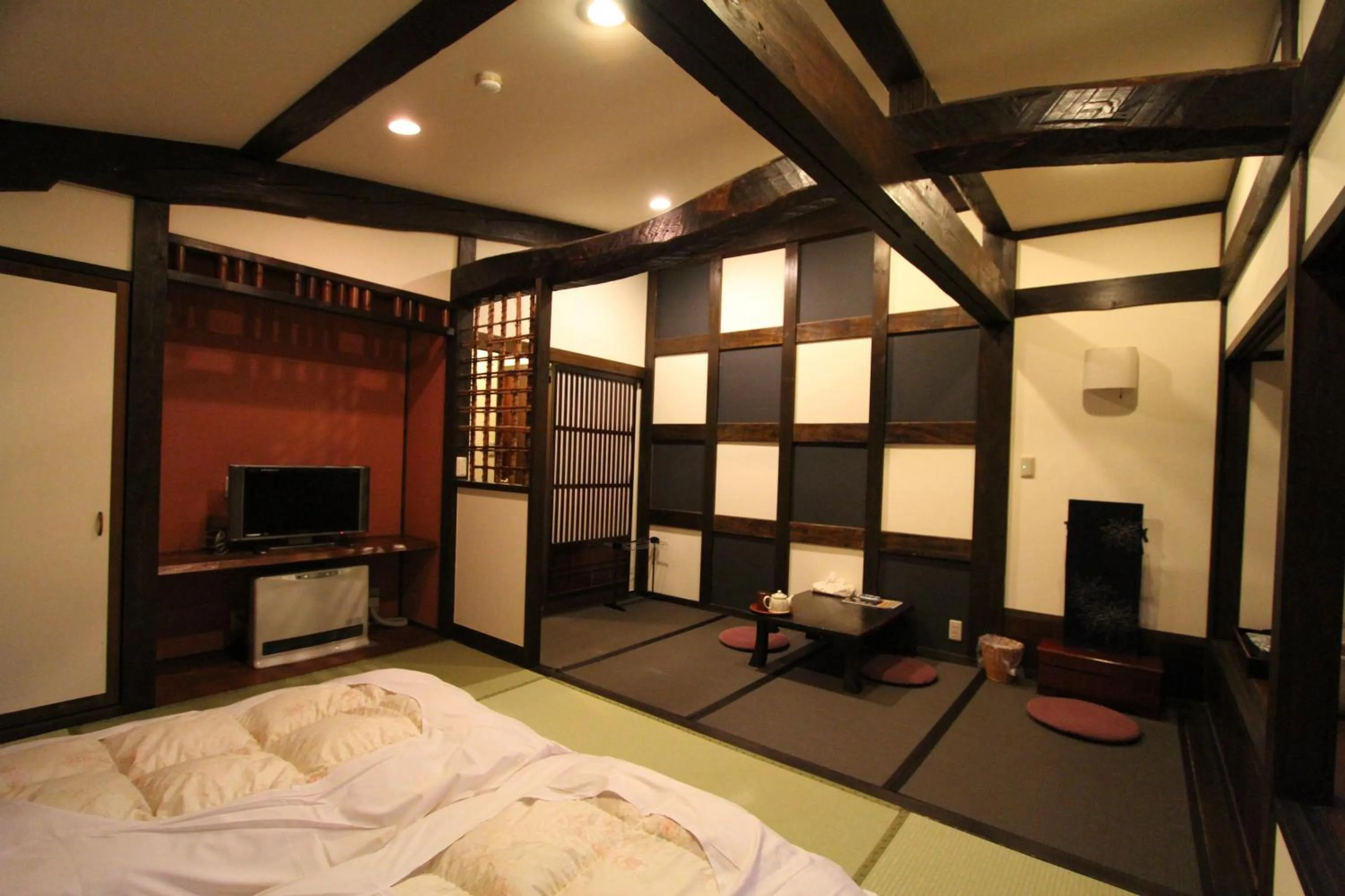 Photo of the whole room, Bed in Minshuku Takizawa