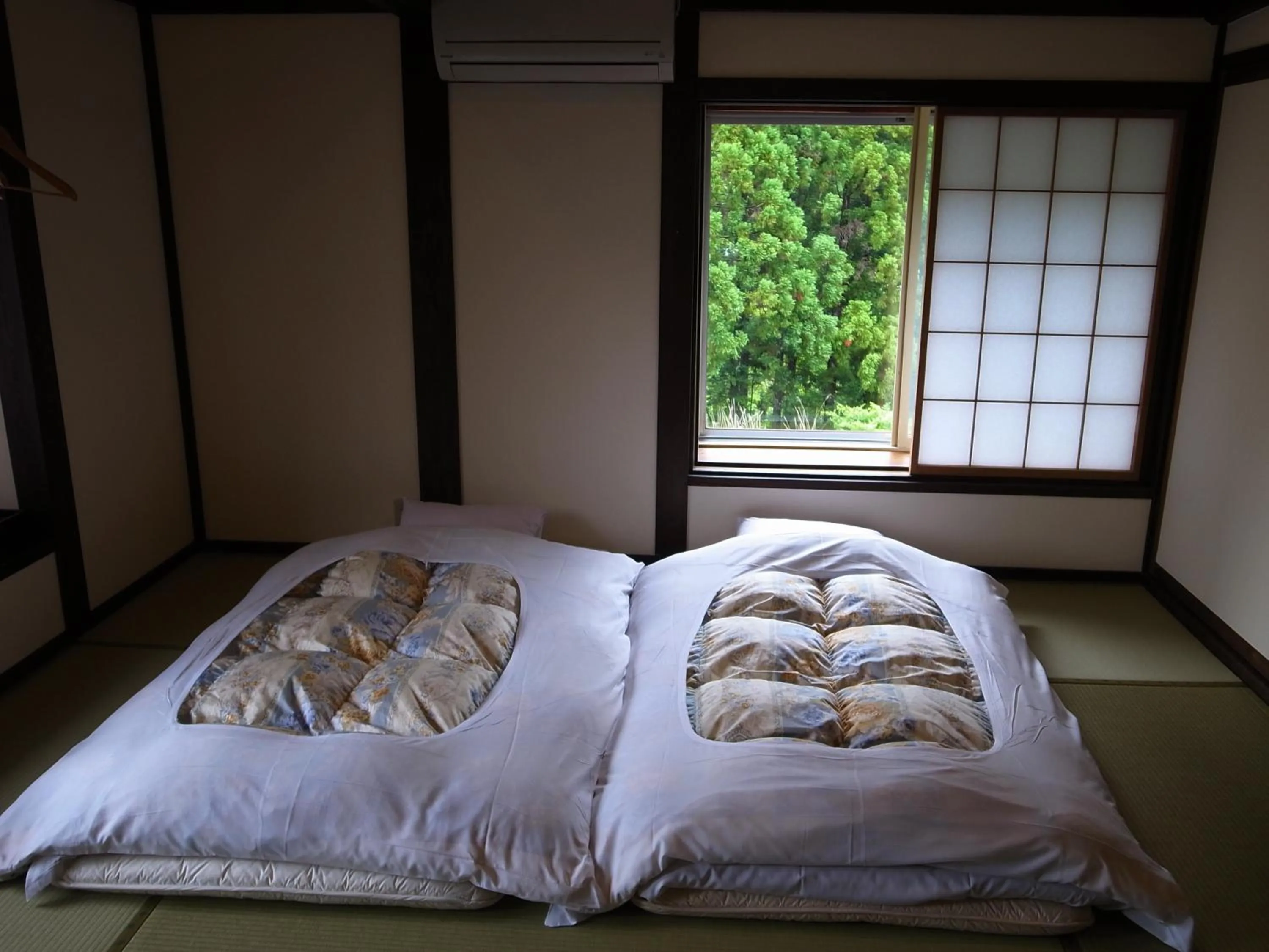 Bed in Minshuku Takizawa