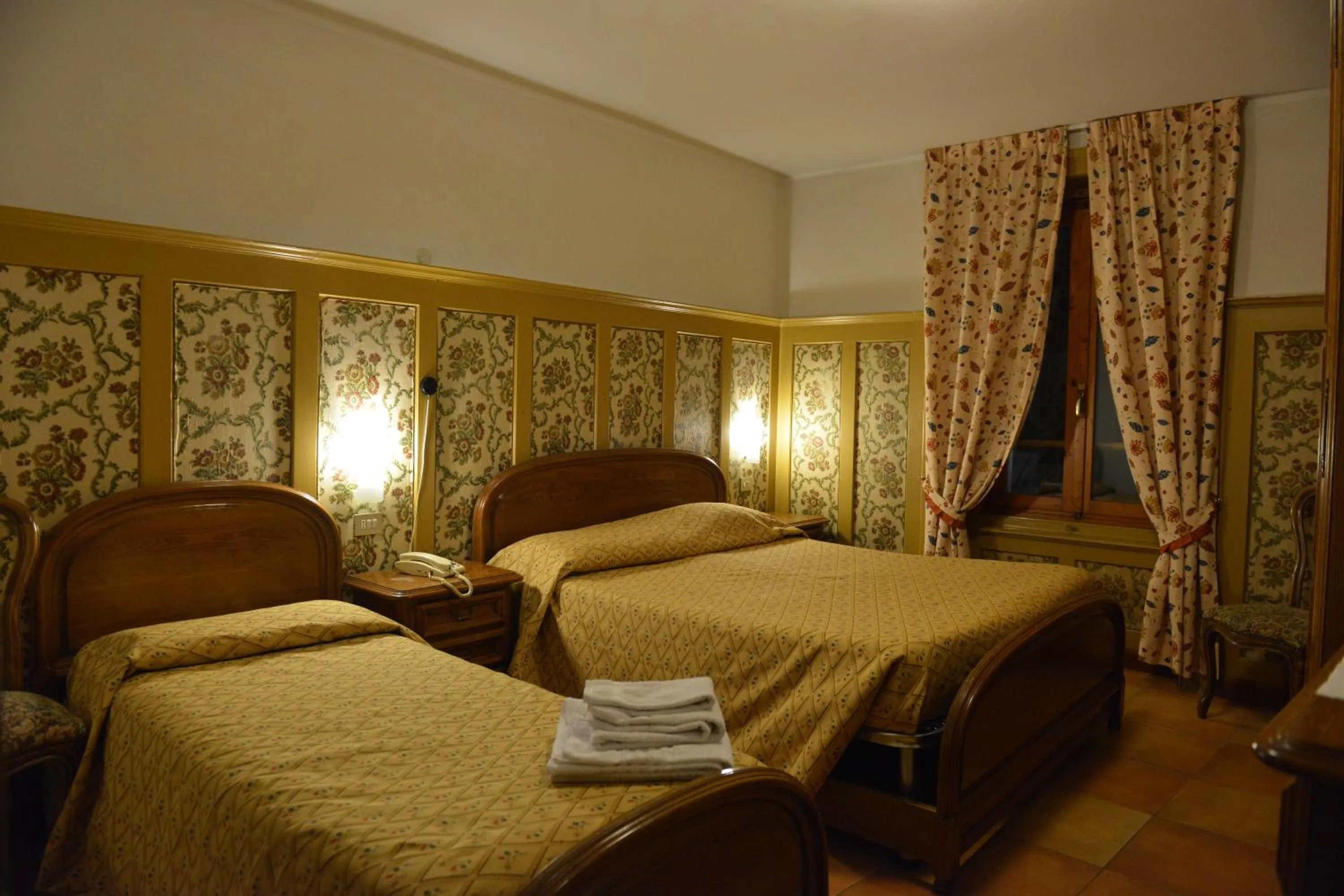 Bed in Hotel Gufo