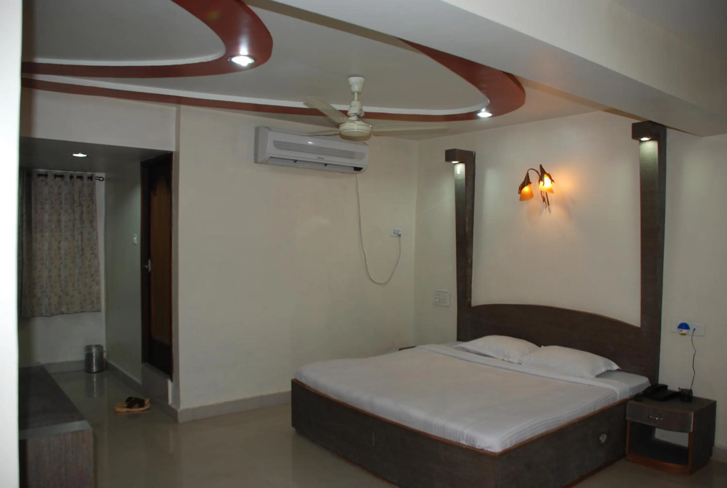 Bed in Hotel Grand Arjun