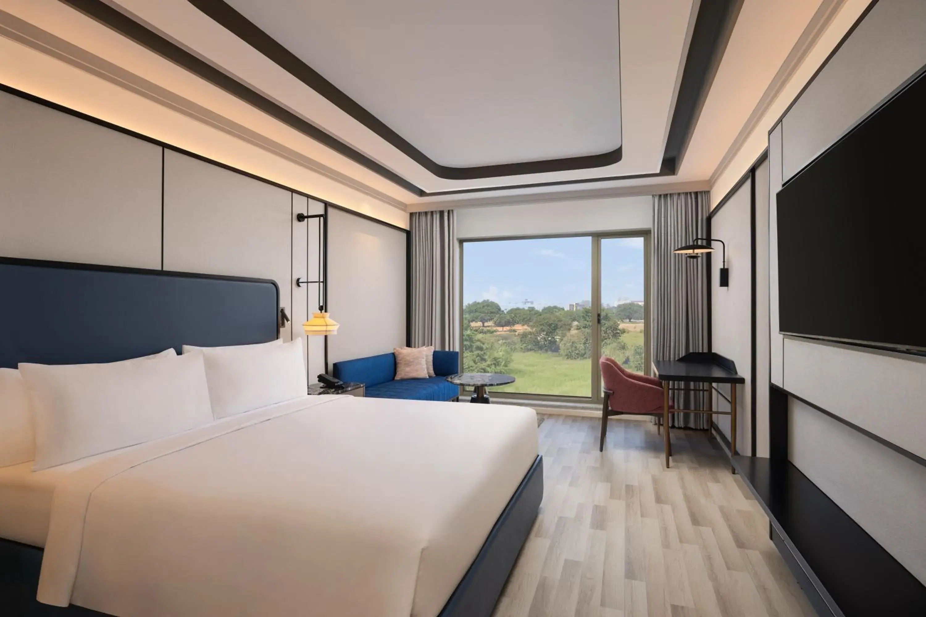 Deluxe King Room with Pool View in Doubletree By Hilton Bengaluru Airport Deluxe King Room with Pool View in Doubletree By Hilton Bengaluru Airport