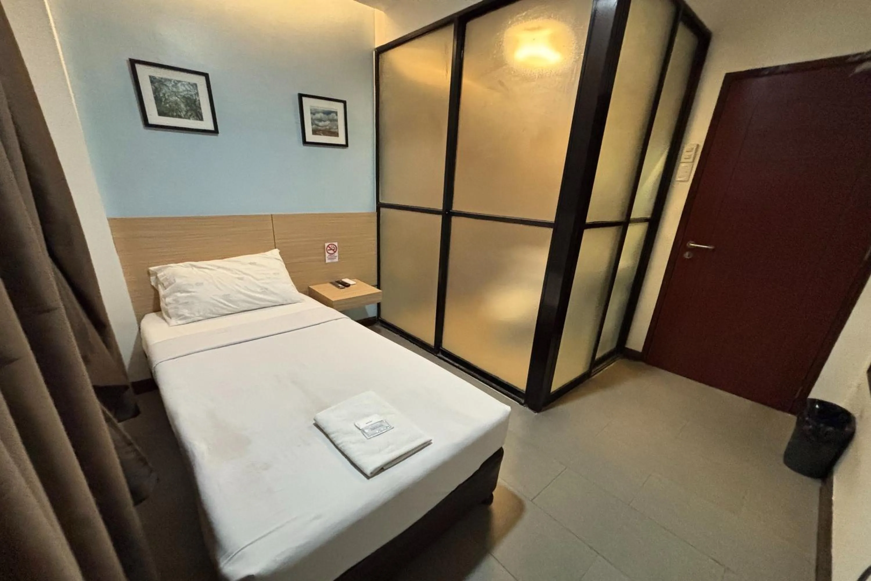 Bed in Alchan Suites