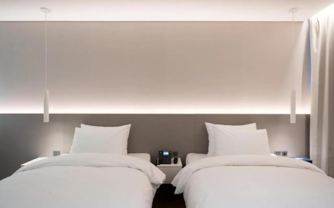 Bed in Daegu Hyeonpung Prana Hotel