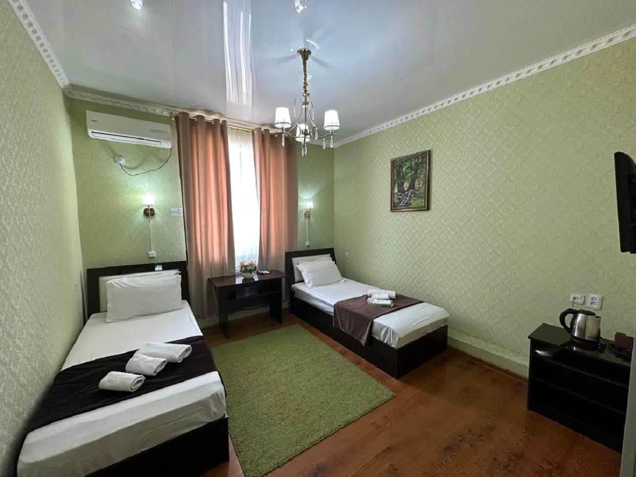 Photo of the whole room, Bed in Hotel Euro Asia Khiva in Ichan Qala