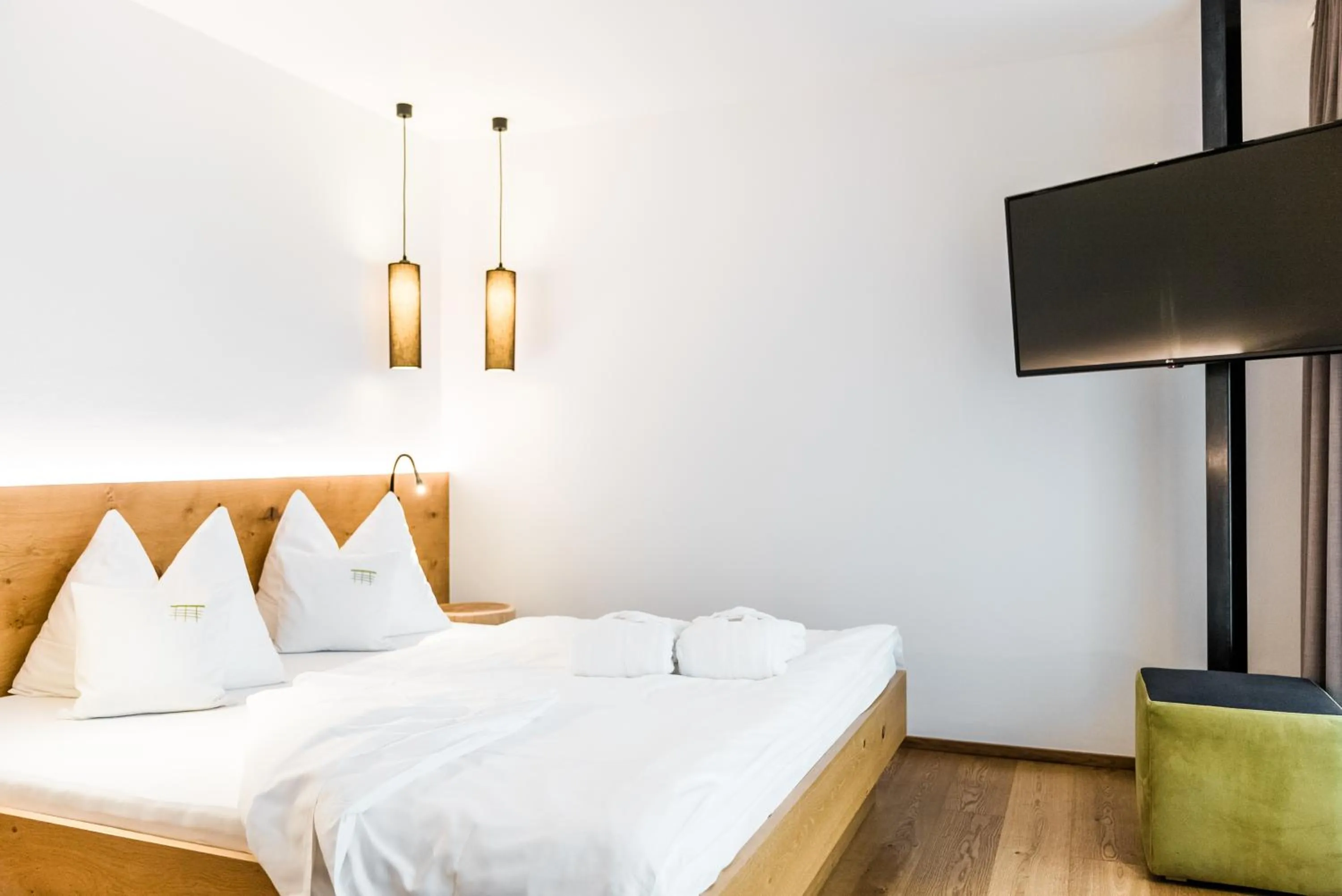 Bed in JOAS natur.hotel.b&b