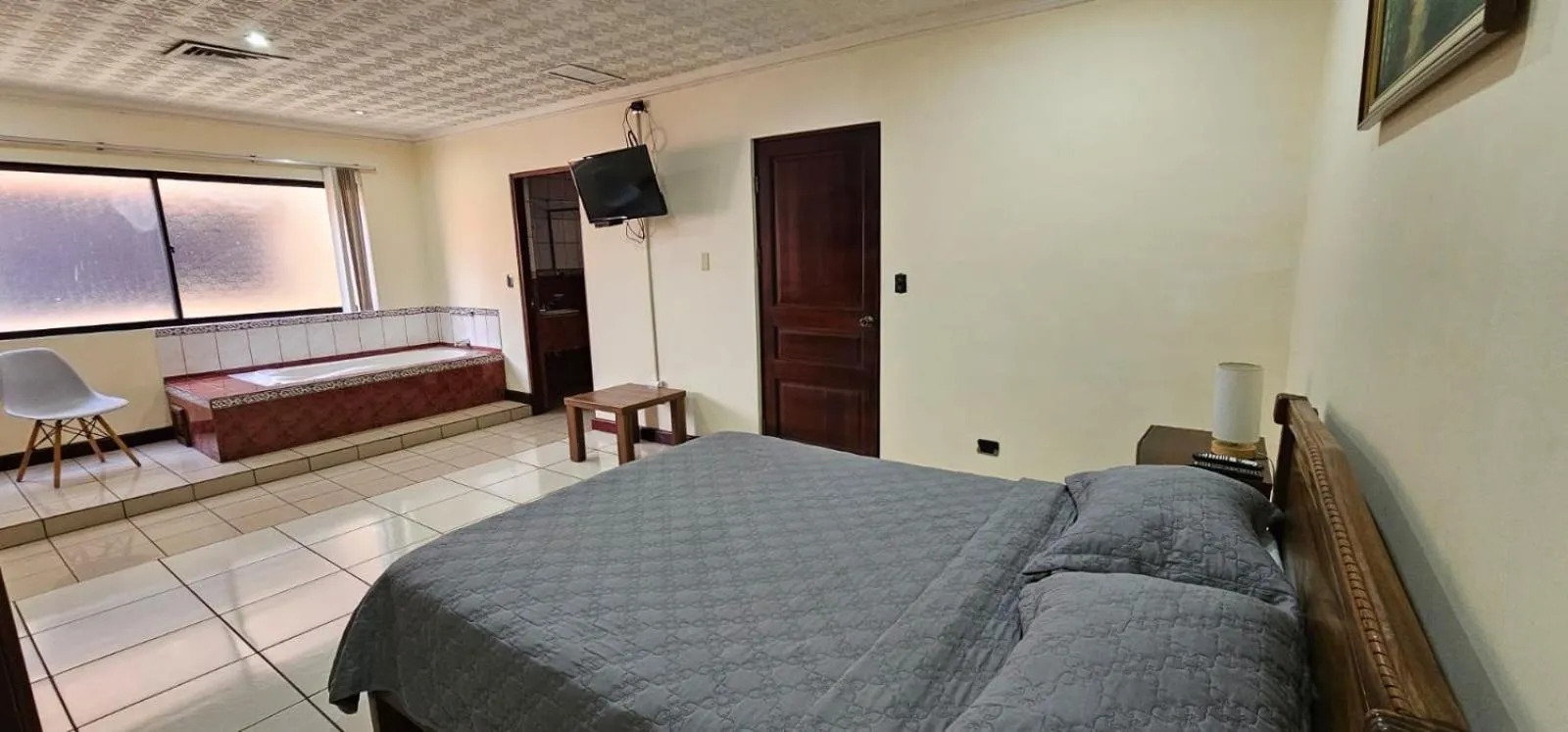 Bed in Apartotel Obelisco San José Aeropuerto