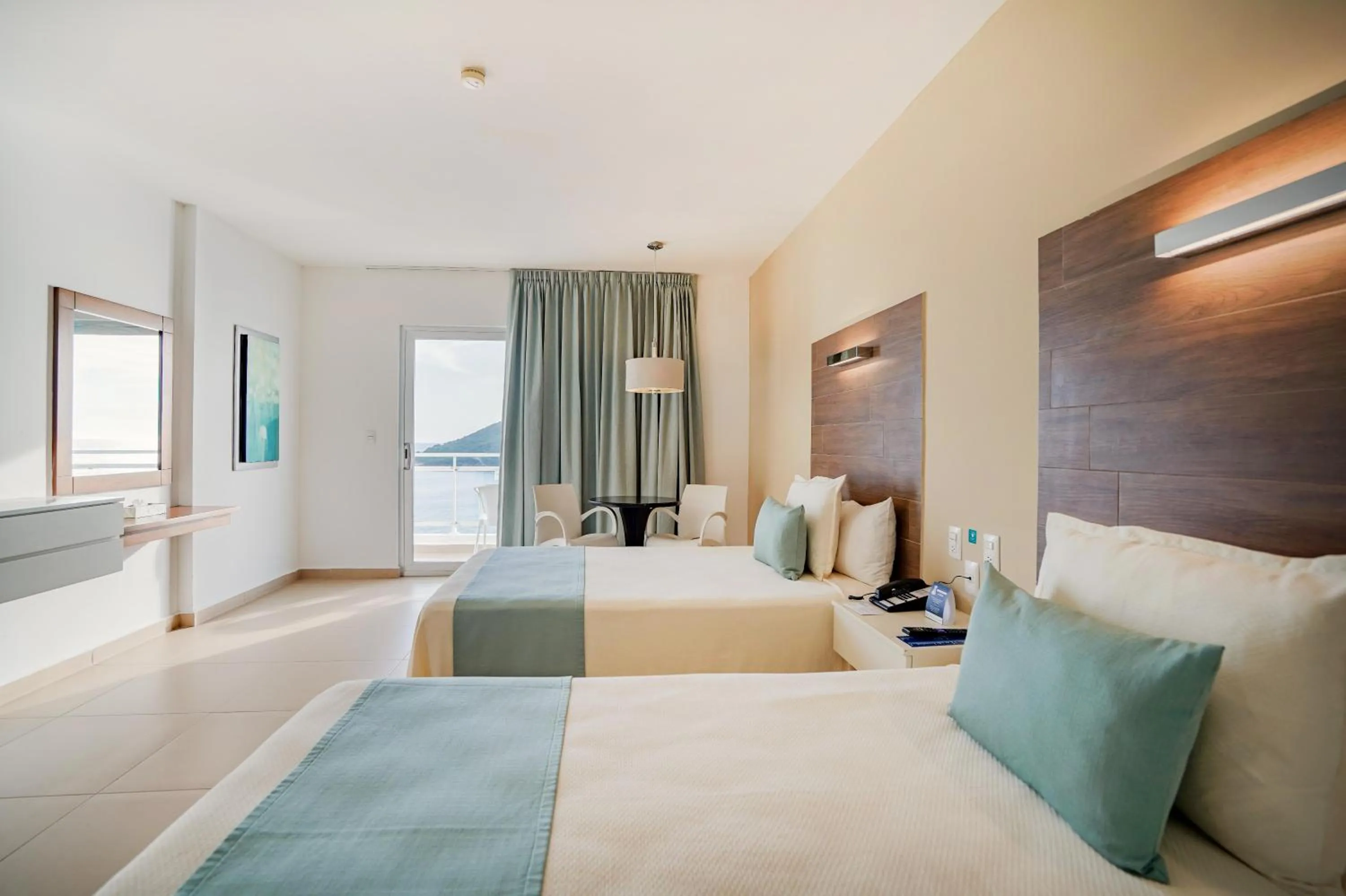 Photo of the whole room, Bed in Pacific Palace Beach Tower Hotel