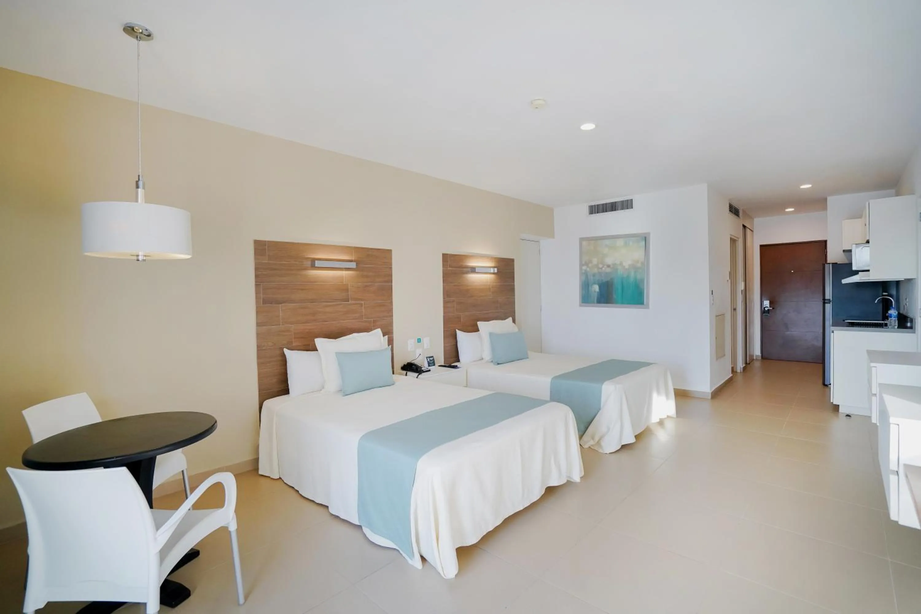 Photo of the whole room, Bed in Pacific Palace Beach Tower Hotel