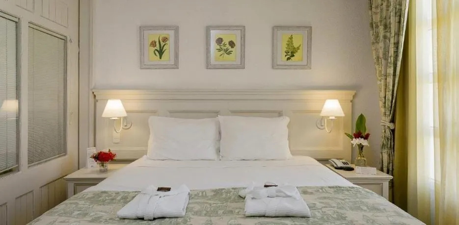 Bed in Il Campanario Villaggio Resort