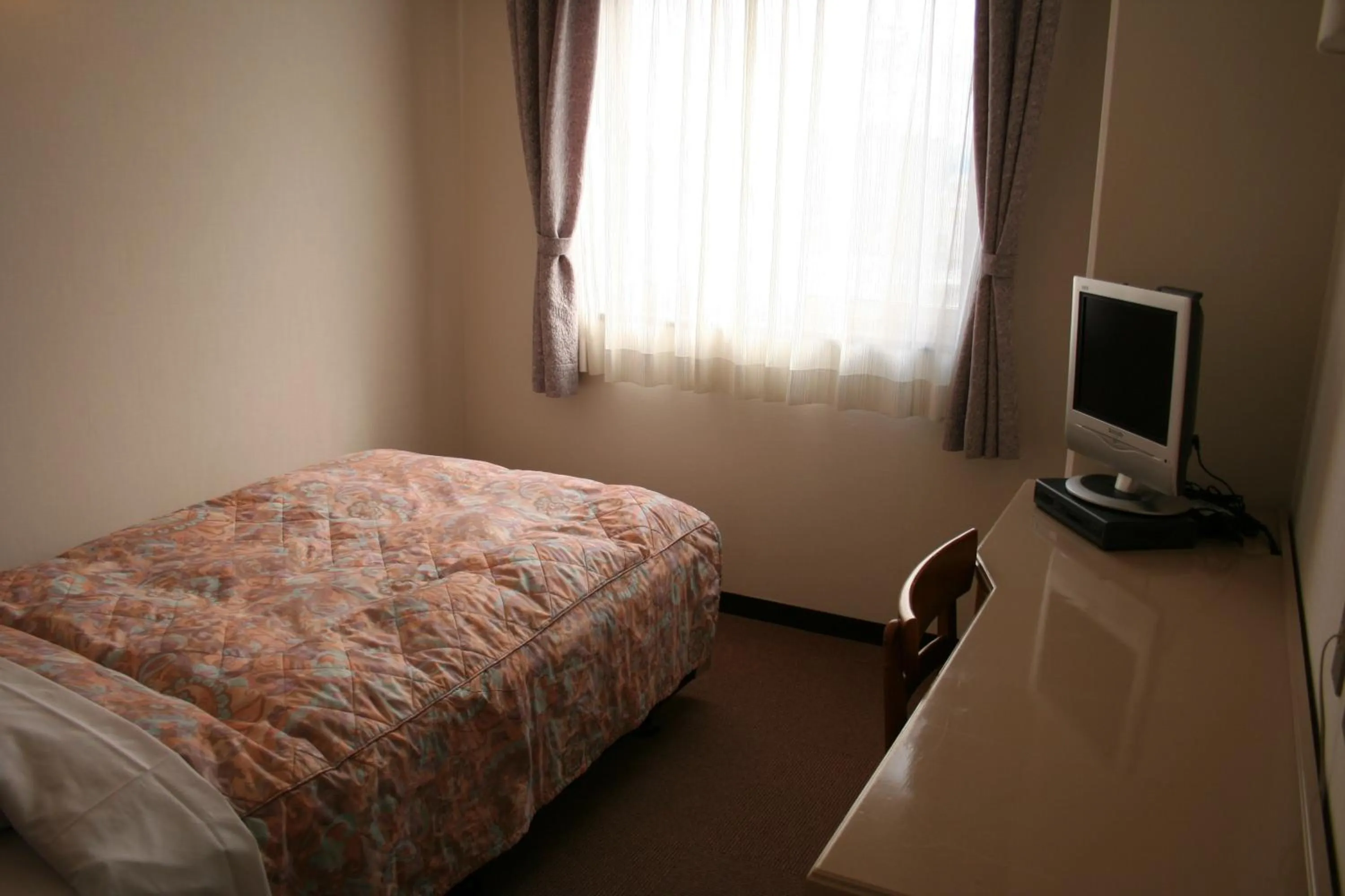 Photo of the whole room, Bed in Hotel Sunshine Tokushima