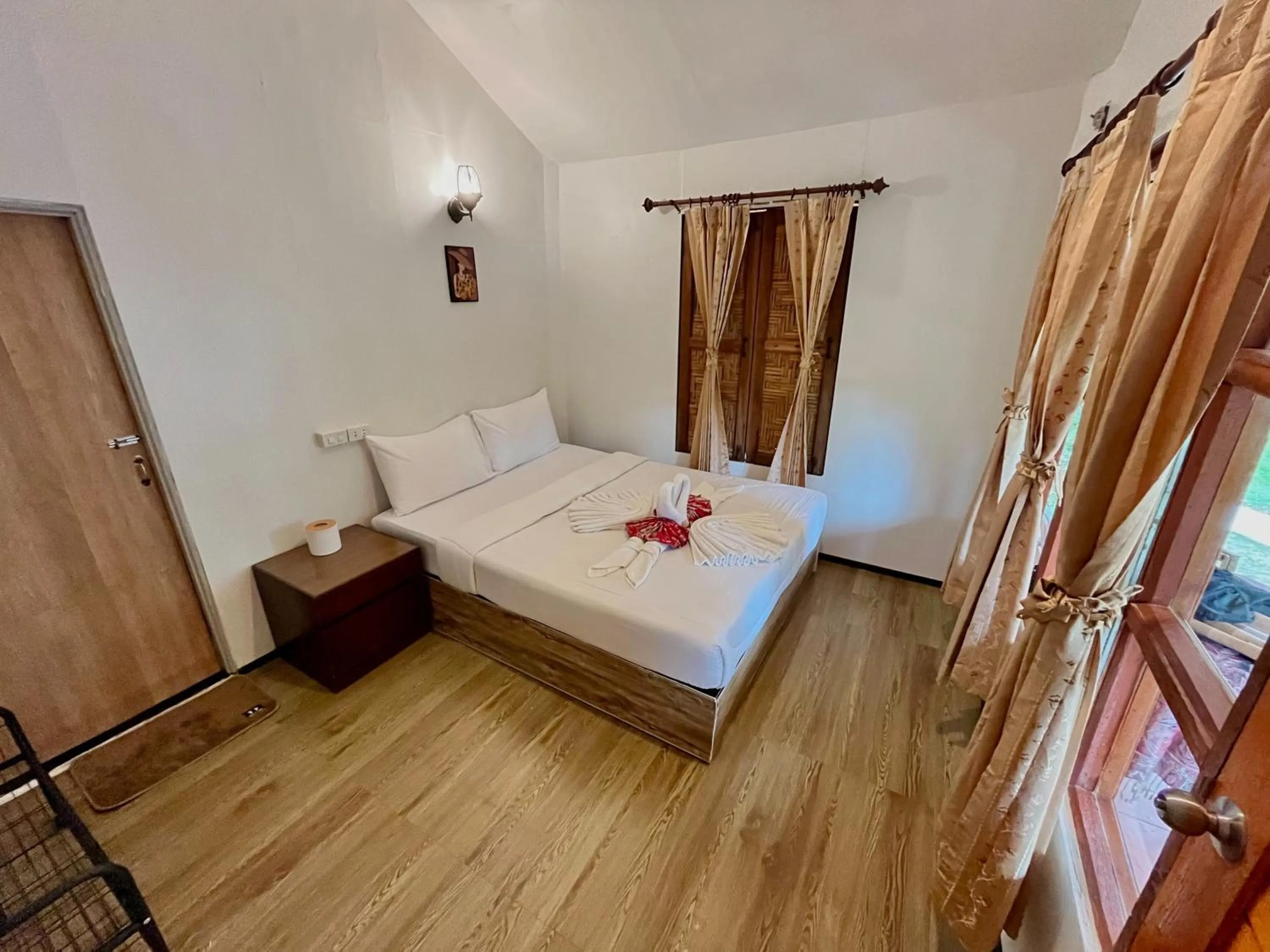 Bed in Koh Mook Garden Beach Resort