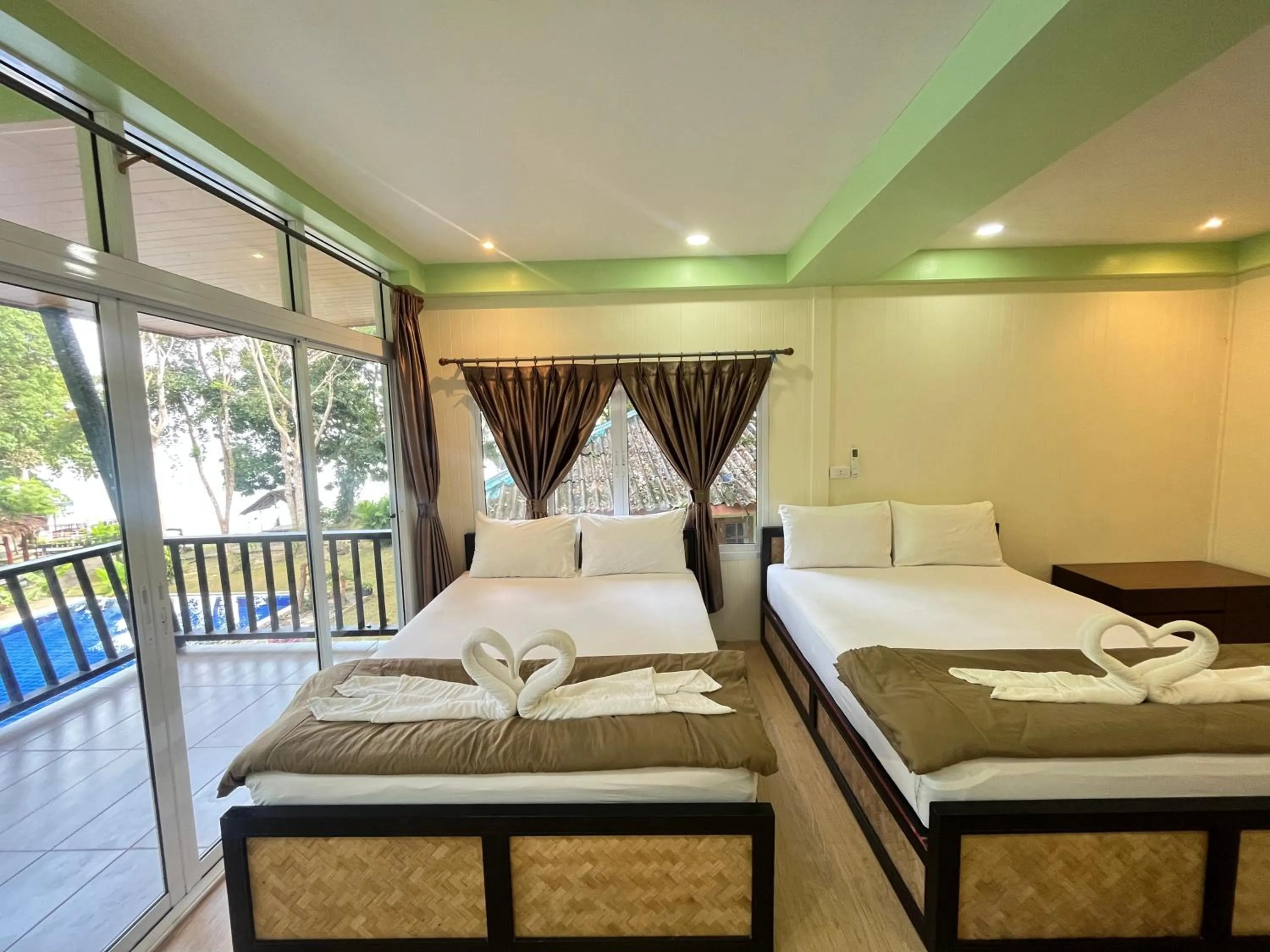 Bed in Koh Mook Garden Beach Resort
