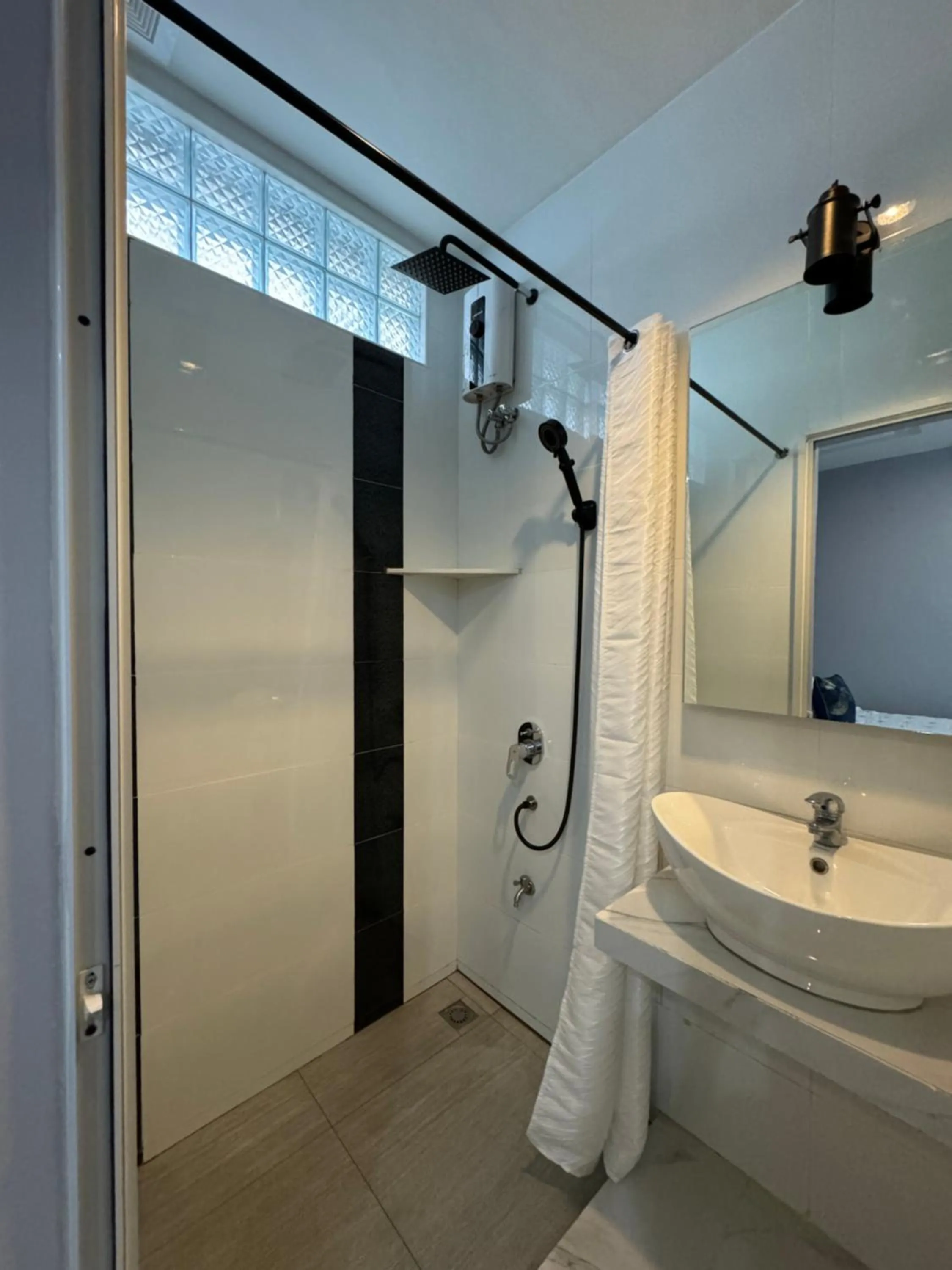 Shower in Anavada Suites - Davao City