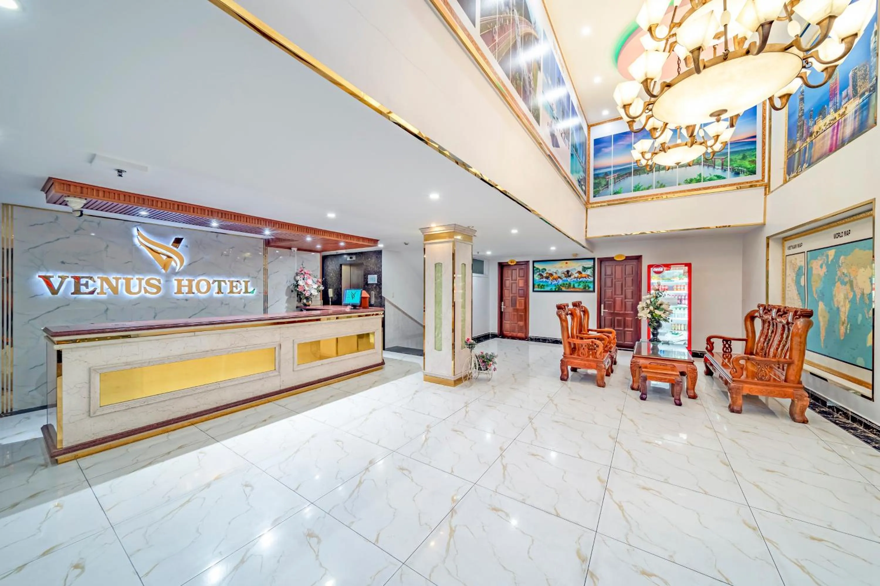 Communal lounge/ TV room in Venus Hotel