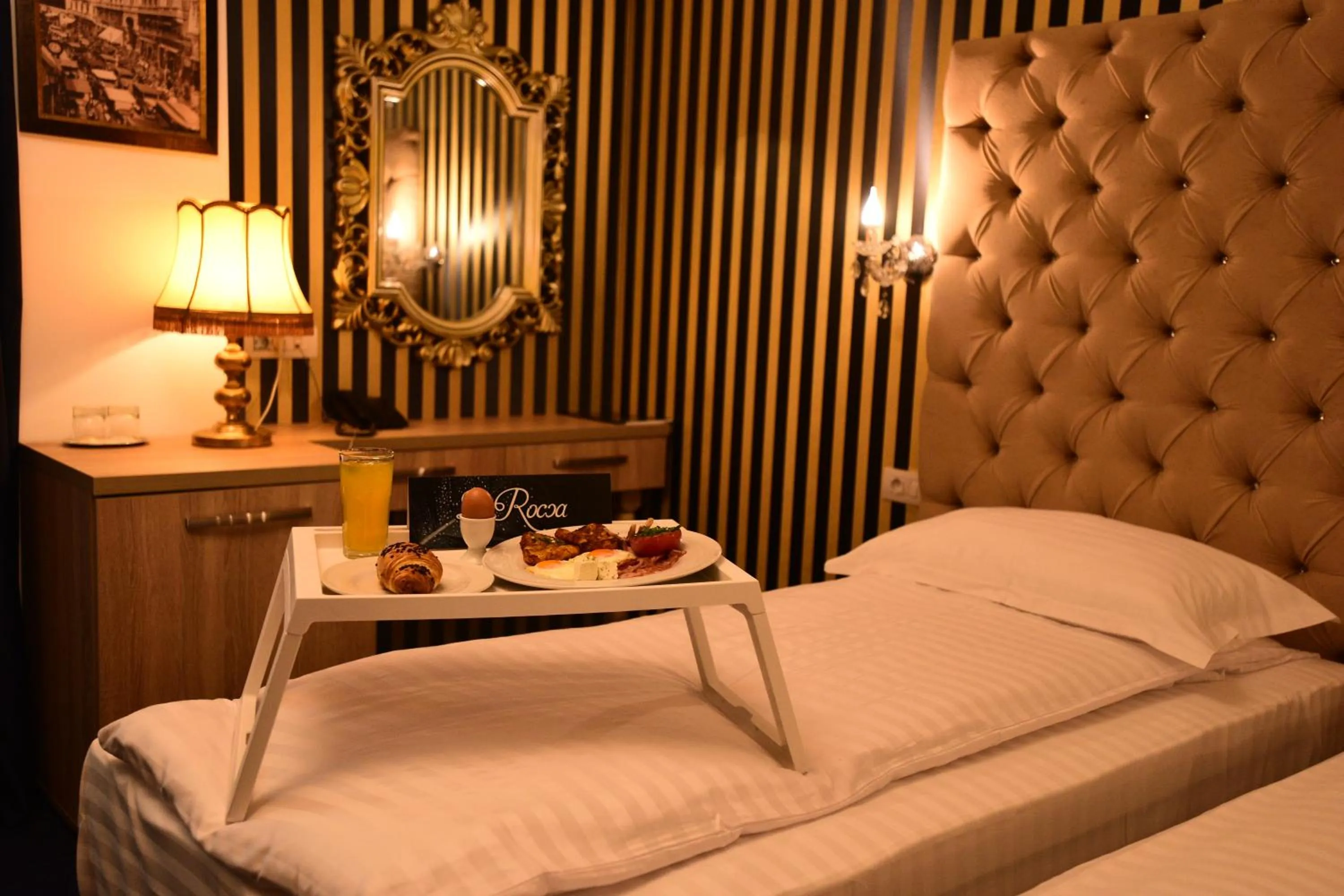 Bed in La Rocca Boutique Hotel