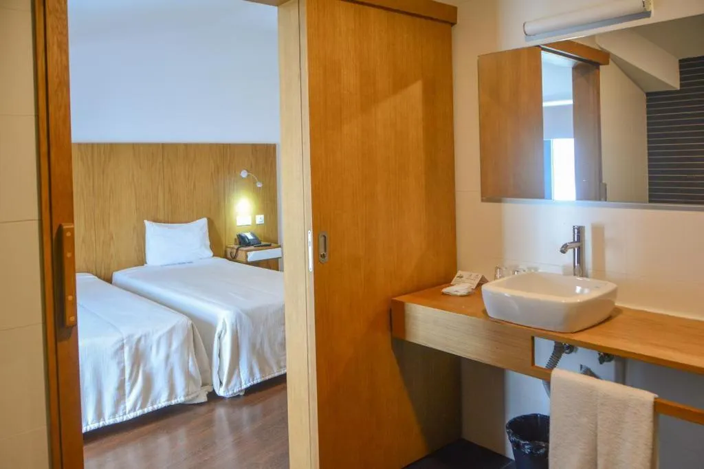 Bed in Belmonte Sinai Hotel