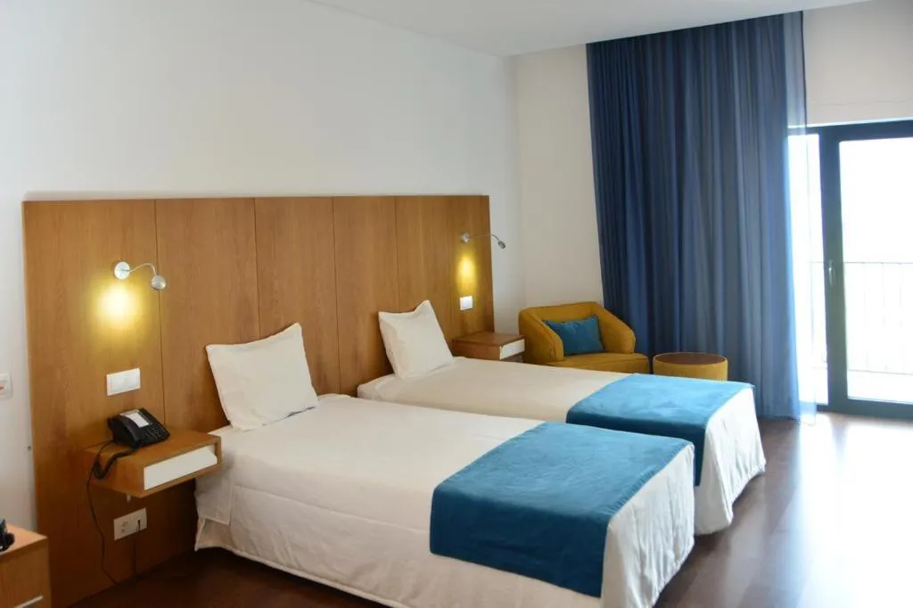 Bed in Belmonte Sinai Hotel