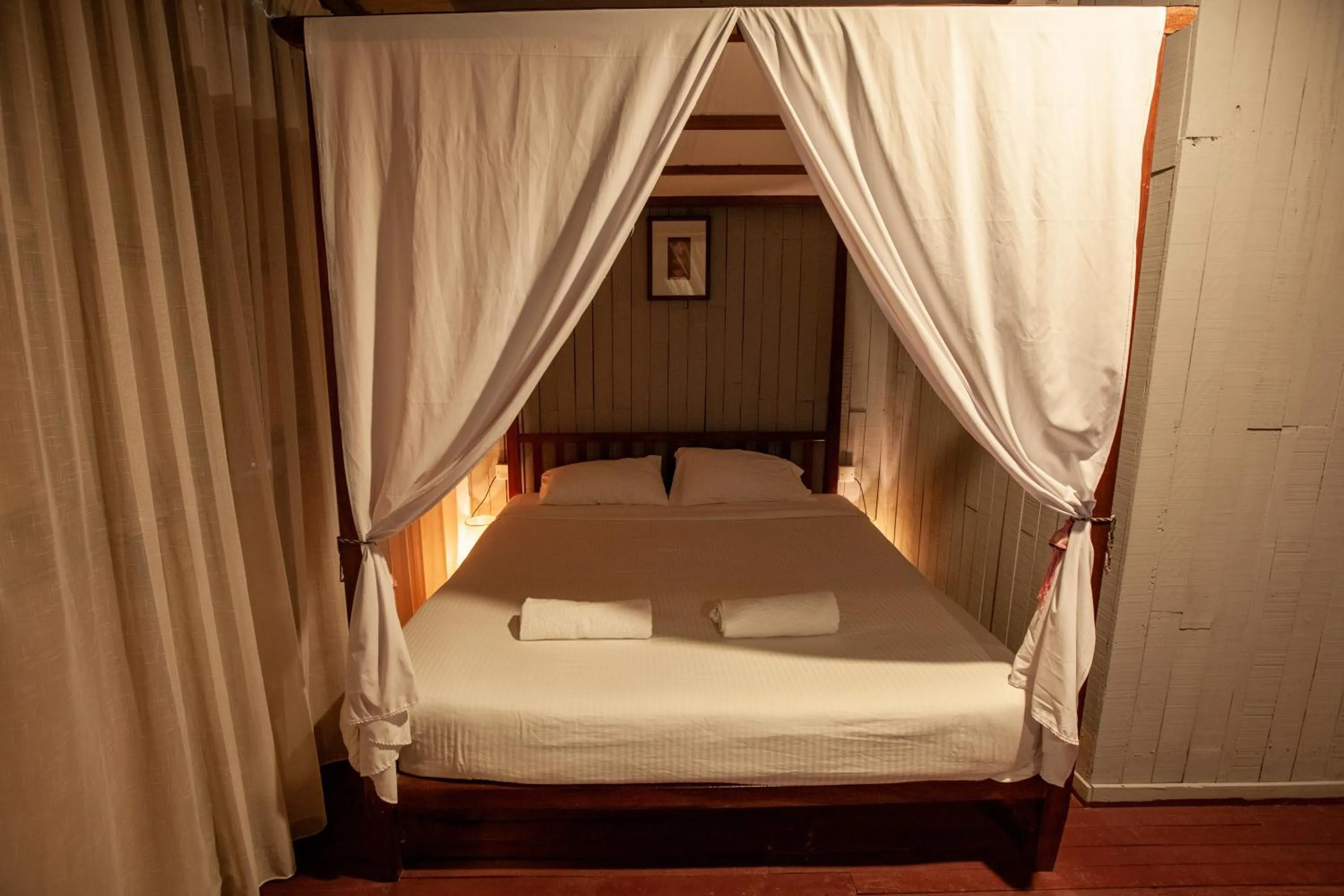 Bed in Joe Fisherman Inn