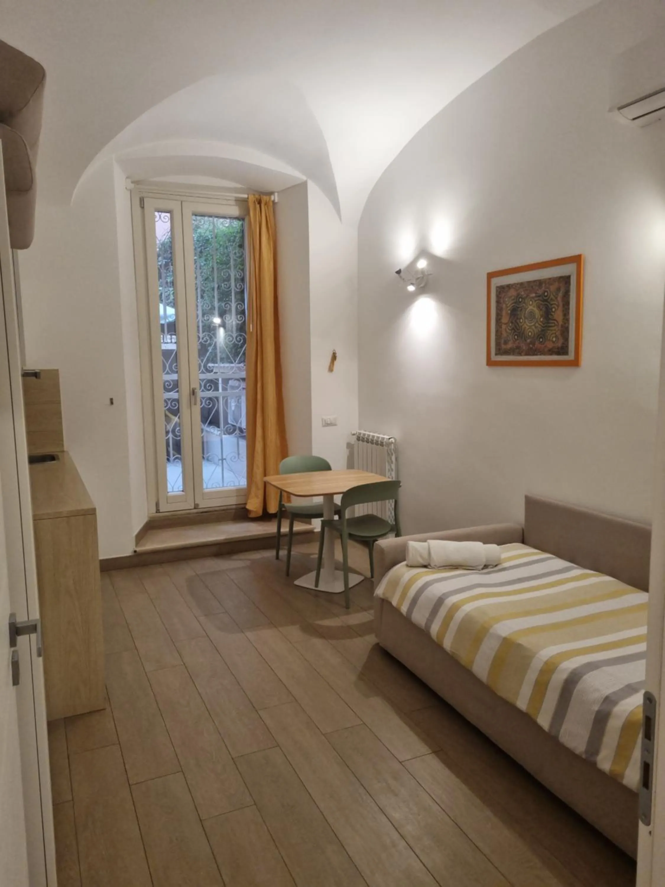 Living room, Bed in La Casetta di Ely