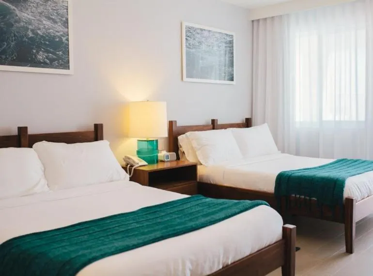 Bed in Tides Inn Hotel