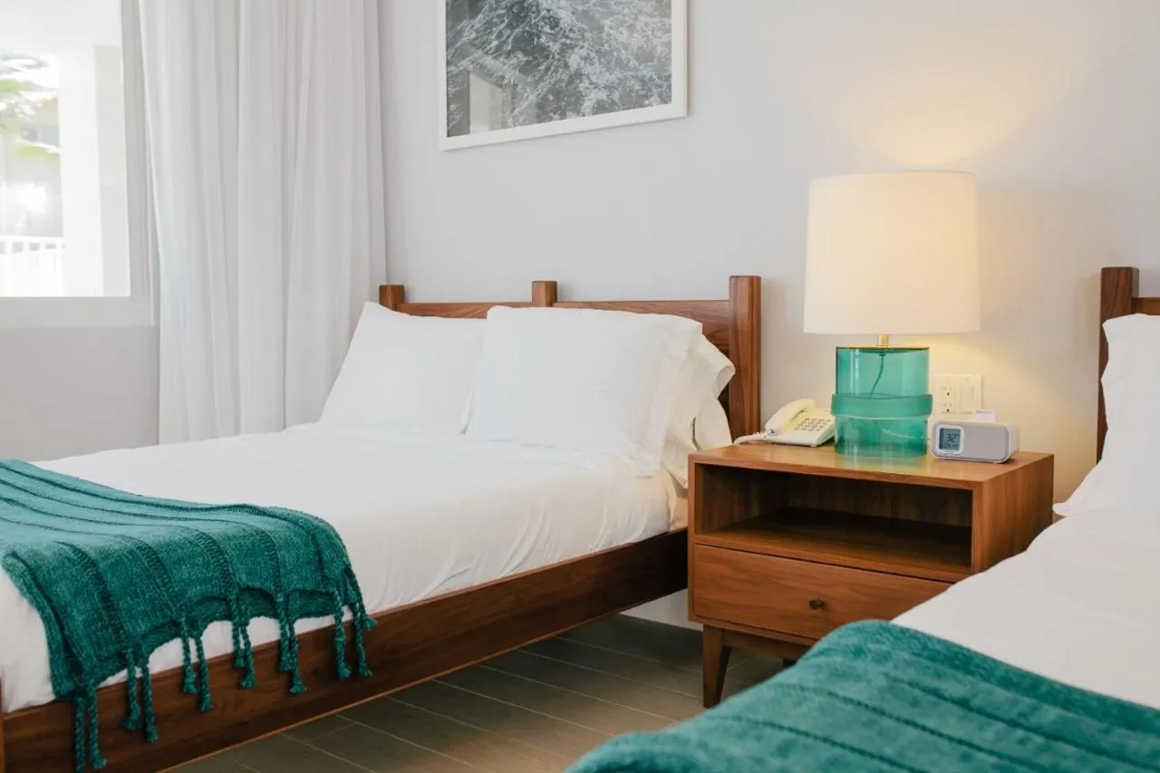 Bed in Tides Inn Hotel