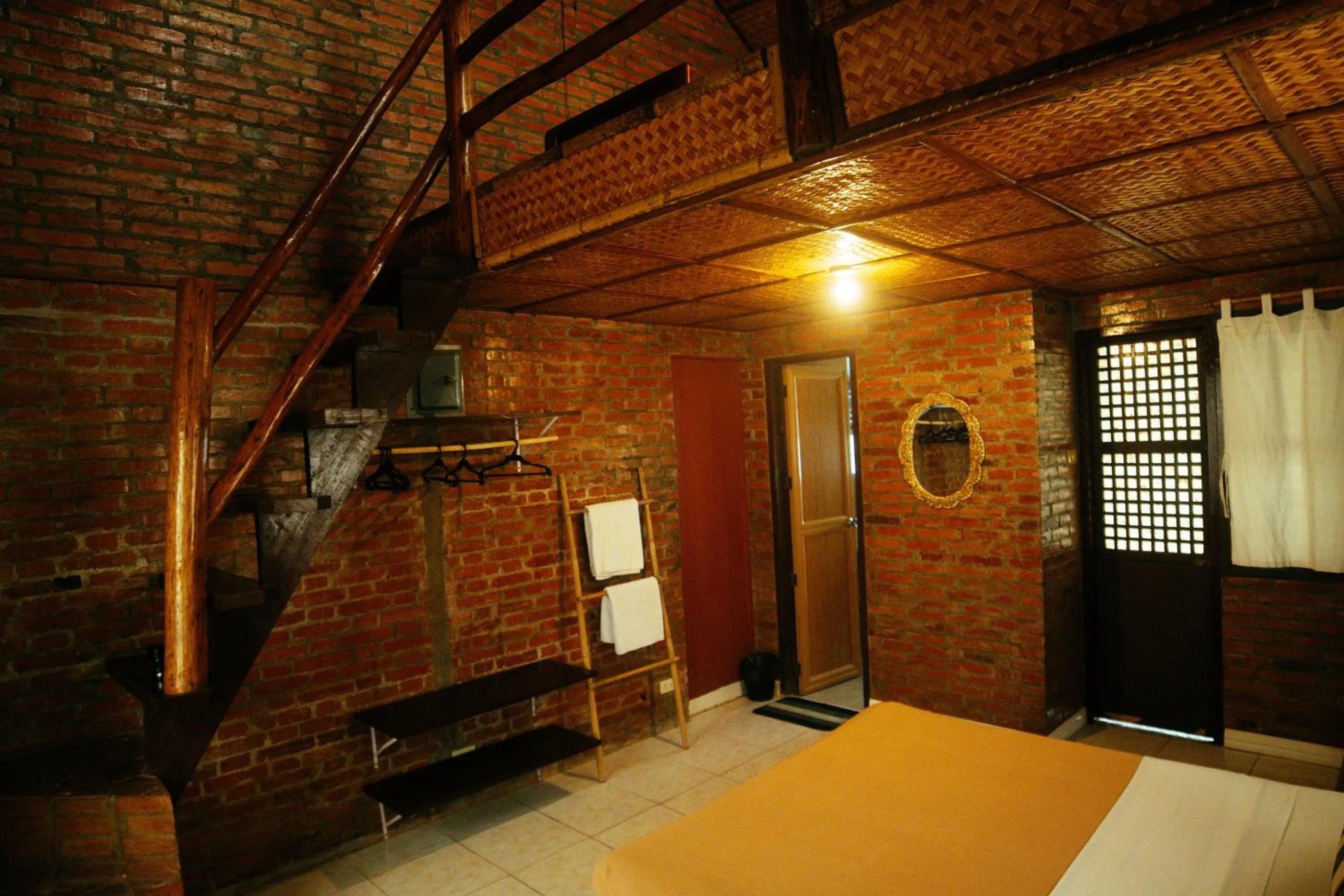 Bed in Marina Palawan Boutique Nature Resort