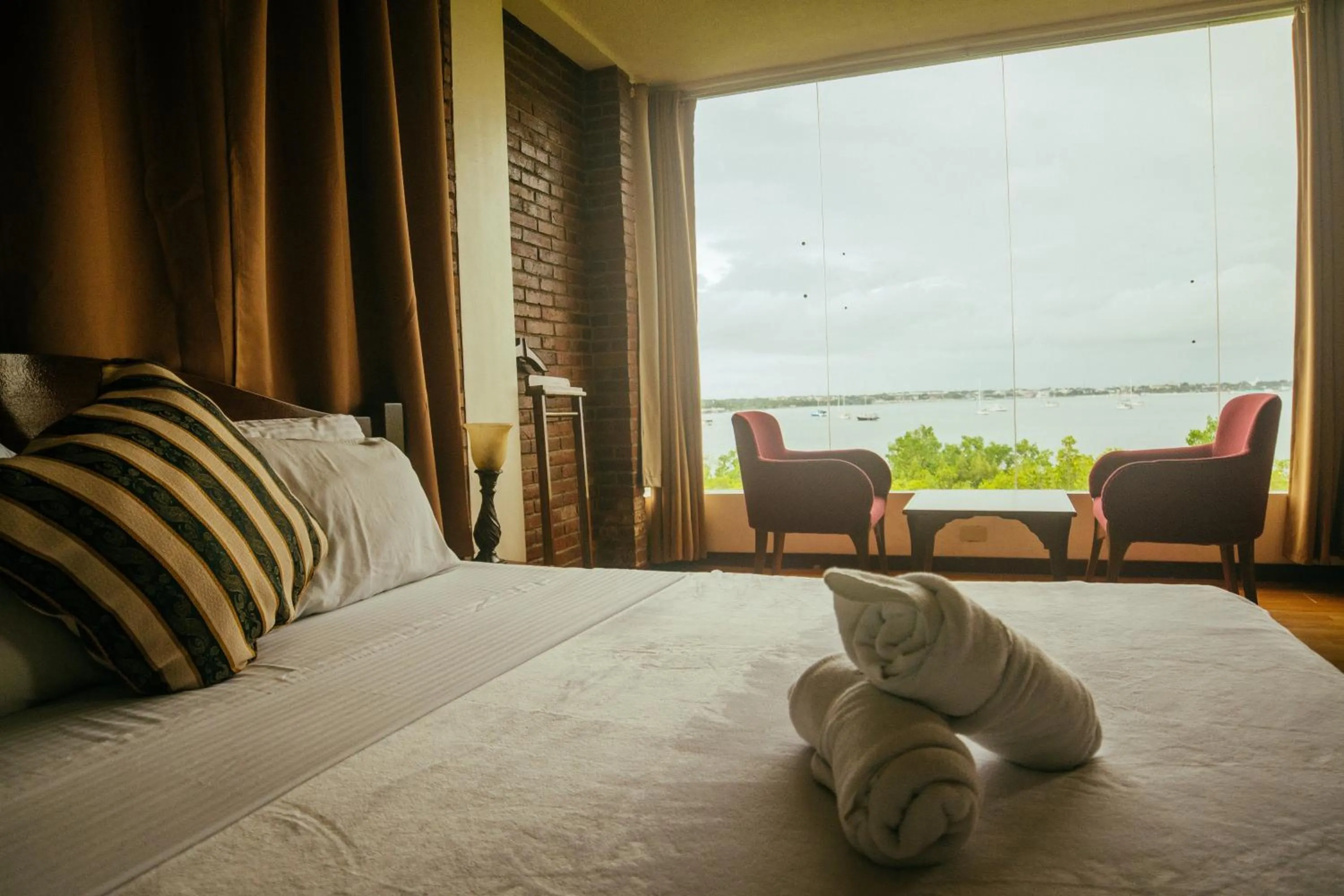 Bed in Marina Palawan Boutique Nature Resort