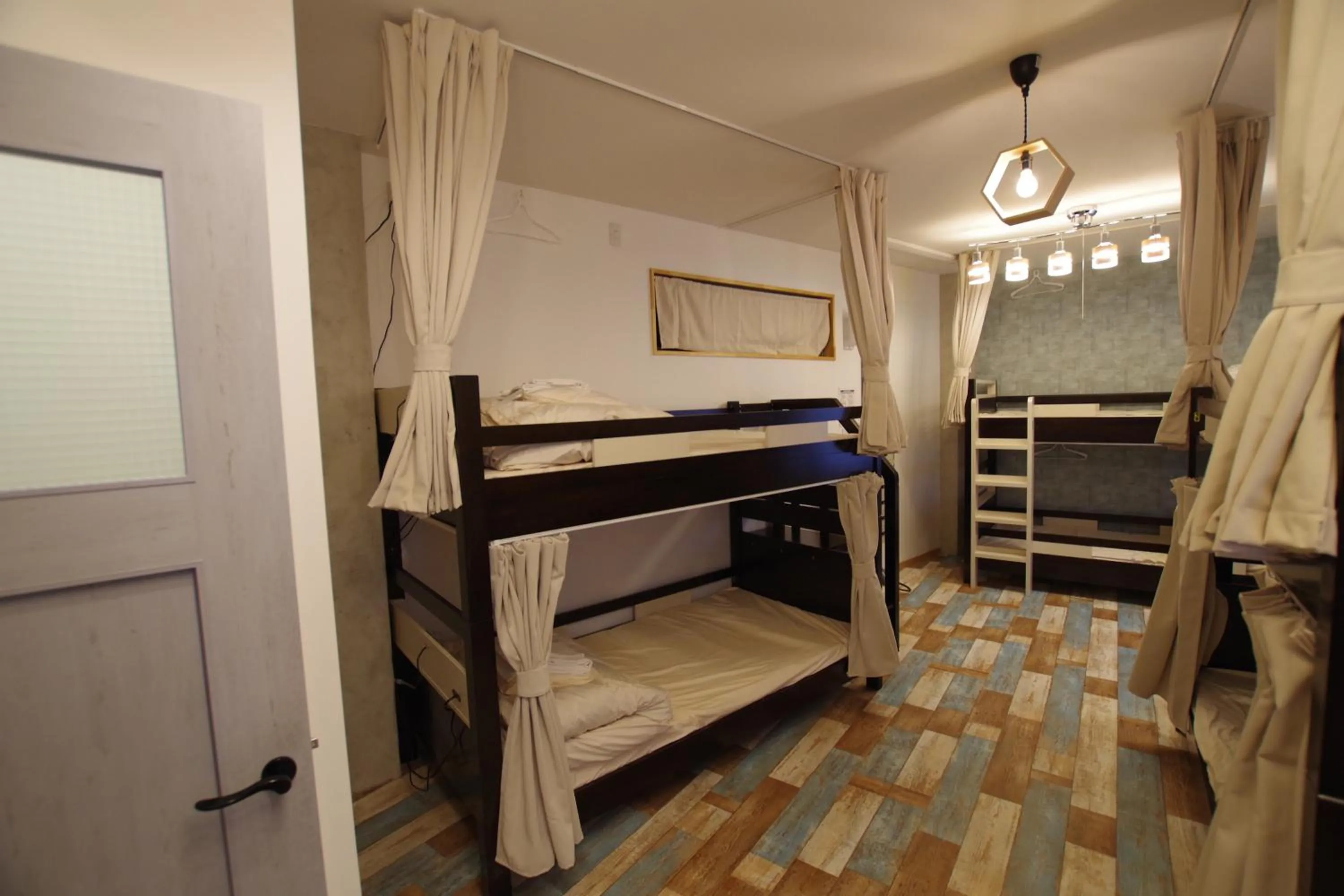 Bed in Cinnamon Guesthouse Dogo