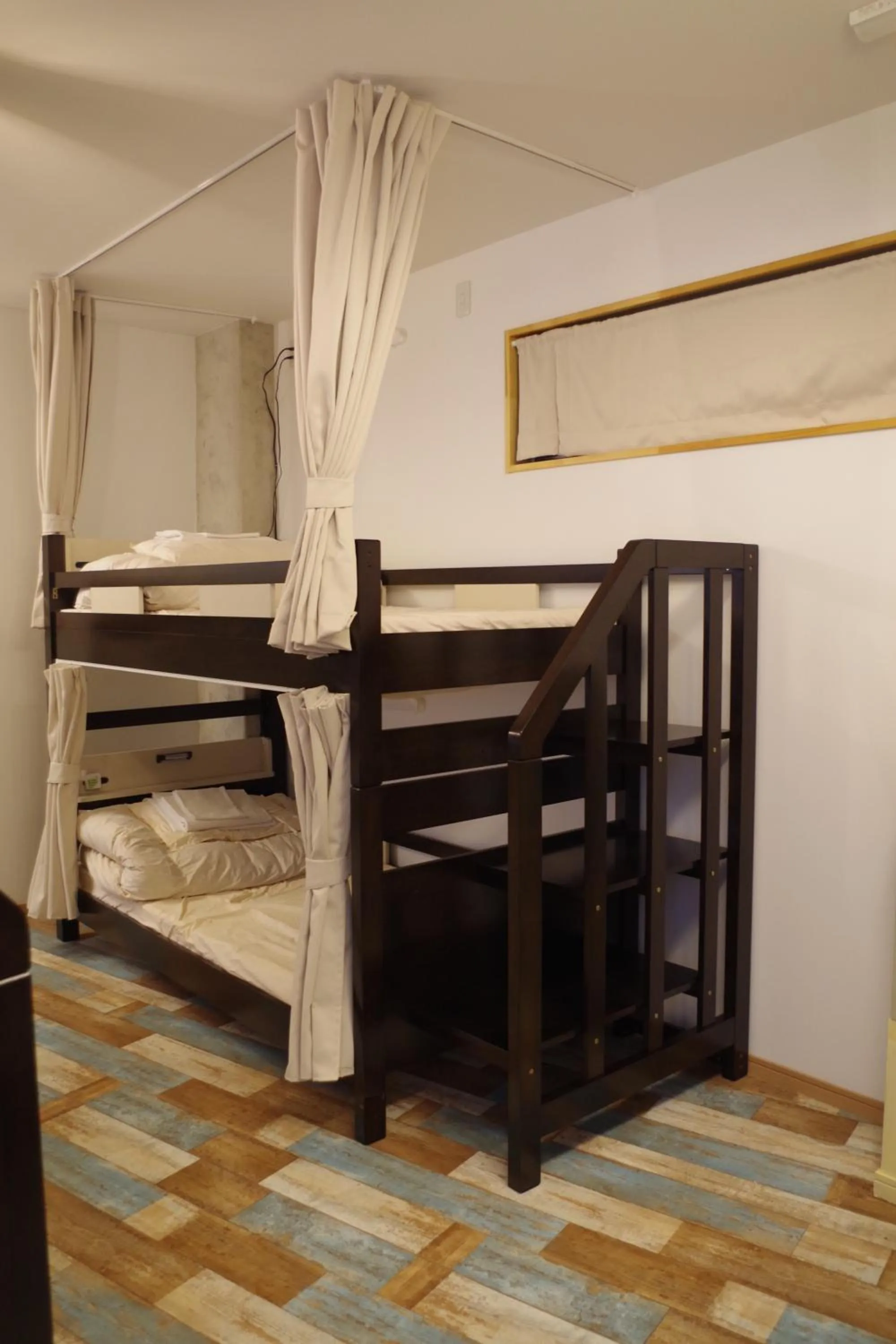 bunk bed, Bed in Cinnamon Guesthouse Dogo